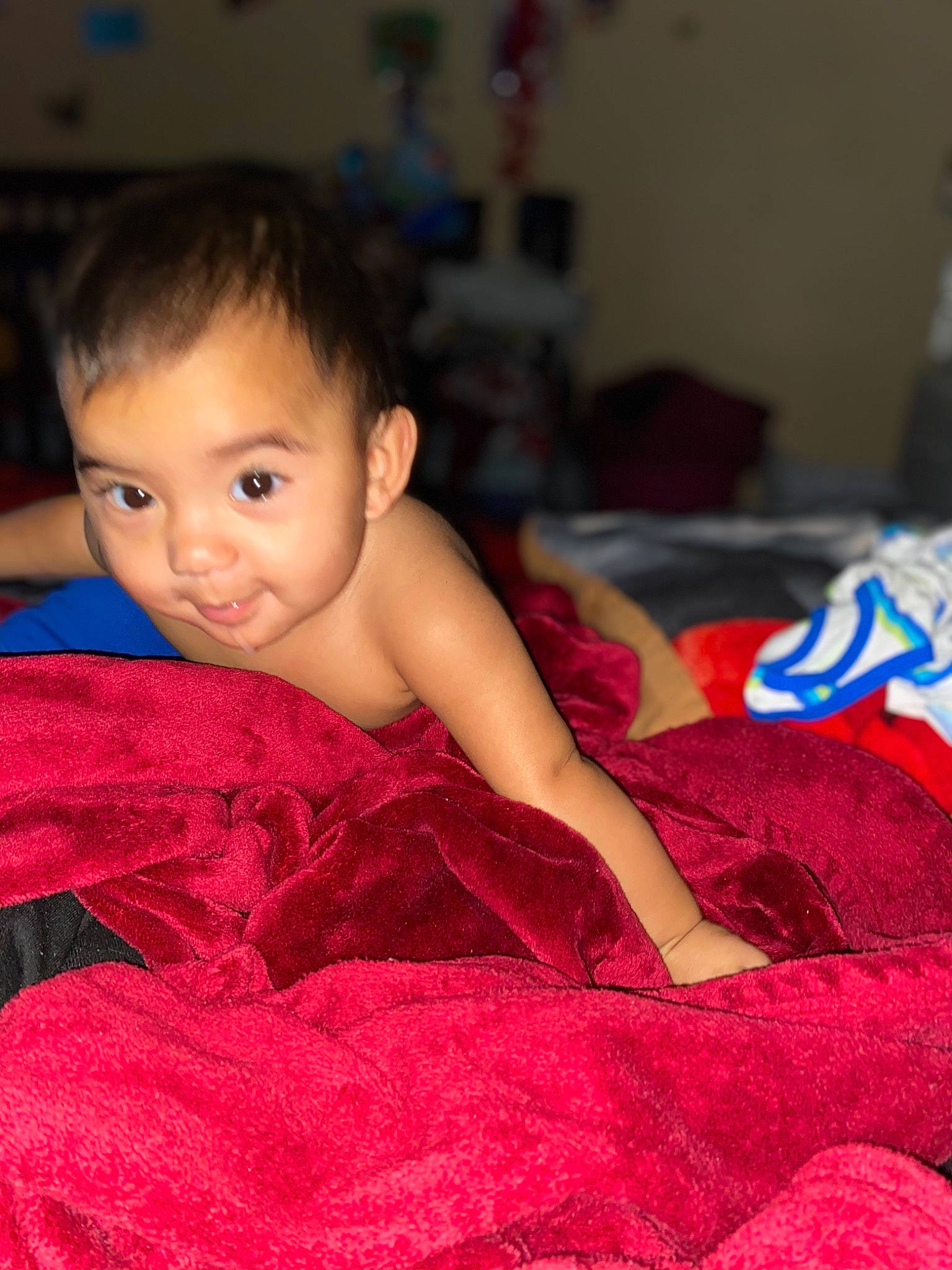 Alejandro joined the competition — help win amazing prizes! baby, baby_toddler_clothing, black_hair, carmine, child, comfort, finger, flooring, fun, fur, happy, human_leg, iris, linens, magenta, person, room, sitting, skin, sleeve