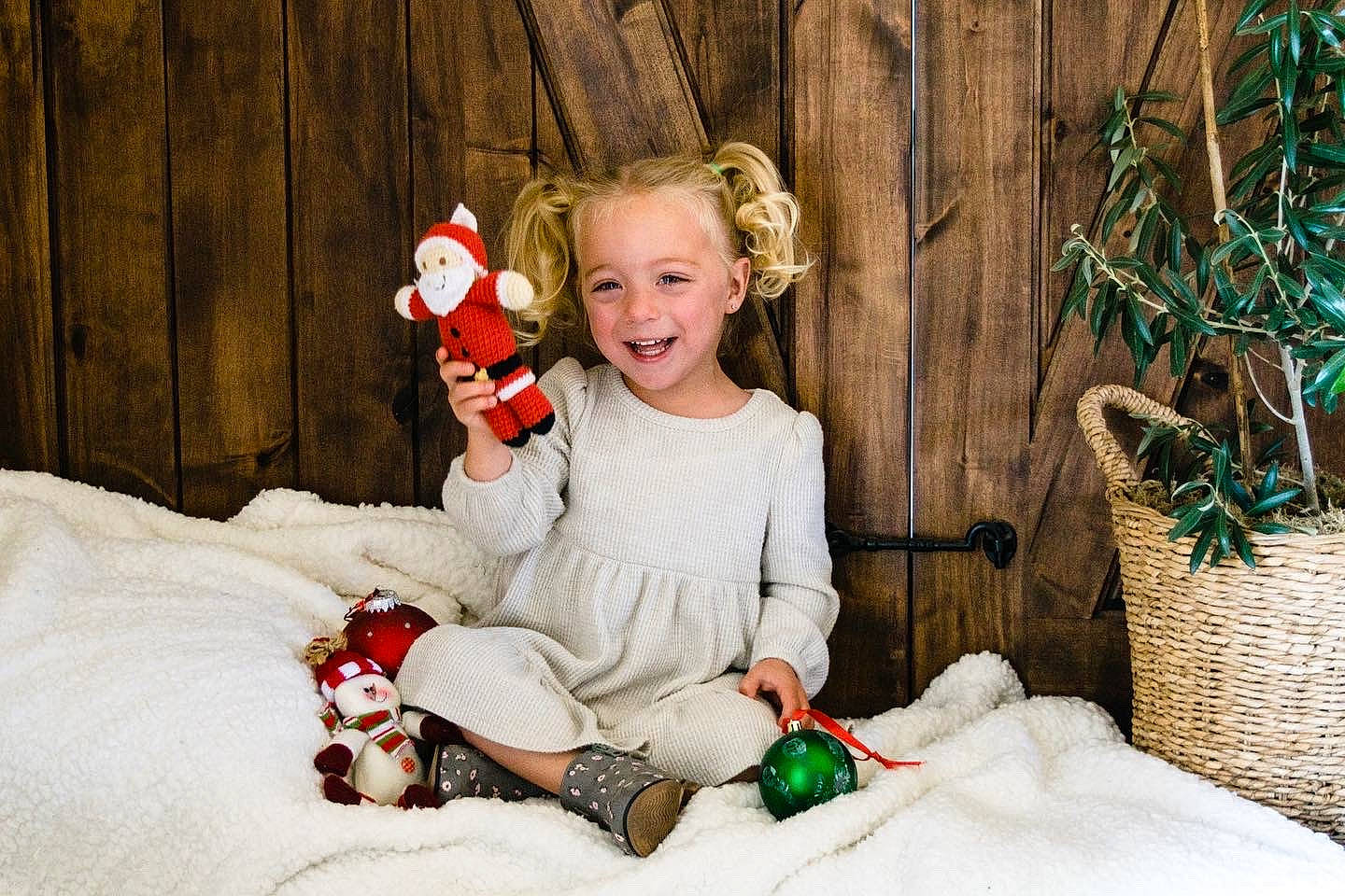 Adalynn joined the competition — help win amazing prizes! baby, basket, child, christmas, christmas_decoration, christmas_ornament, event, eye, fun, grass, happy, head, holiday, human_body, jewellery, joy, lap, person, sitting, smile
