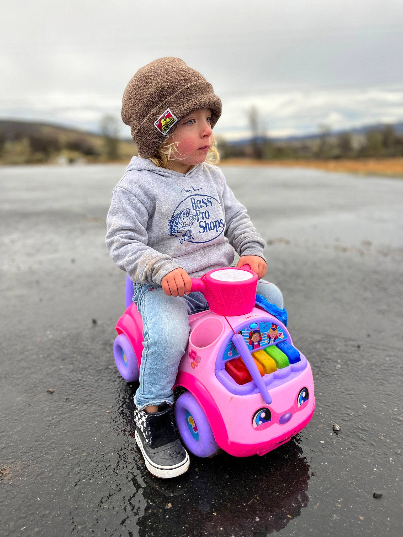 Adalynn joined the competition — help win amazing prizes! asphalt, automotive_design, automotive_lighting, automotive_tire, automotive_wheel_system, cap, cloud, happy, headwear, helmet, motor_vehicle, person, pink, recreation, riding_toy, rolling, sky, tire, toddler, travel