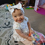 Annalee joined the competition — help win amazing prizes! baby, bag, cabinet, carpet, child, childhood, colorful, couch, cute, dress, floor, happy, headband, indoor, playroom, smiling, stuffed_animal, tent, toy, xylophone