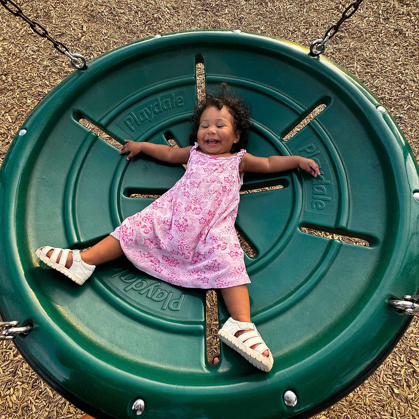 Naiari is registered to the contest to win money with this photo: child, clothing, face, female, footwear, girl, grass, head, nature, outdoorplayarea, outdoors, park, person, photography, plant, playarea, portrait, sandal, shoe, summer