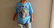 Dariel joined the competition — help win amazing prizes! blue_tshirt, boy, cartoon_characters, casual_clothing, child, confident, curly_hair, cute, fashion, floor, indoor, jeans, person, plain_wall, playful, portrait, shoes, smiling, standing, wooden_floor
