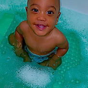 Aiyan joined the competition — help win amazing prizes! baby, bathtub, bath_bubbles, child, foam, happy, infant, kid, looking_up, person, playful, smiling, sitting, water, wet_skin, young_child, cute, bath_time, indoors, skin