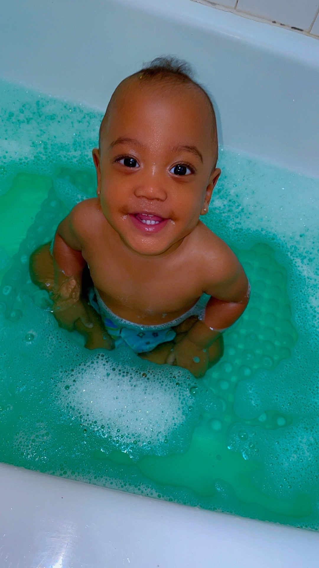 Aiyan joined the competition — help win amazing prizes! baby, bathtub, bath_bubbles, child, foam, happy, infant, kid, looking_up, person, playful, smiling, sitting, water, wet_skin, young_child, cute, bath_time, indoors, skin