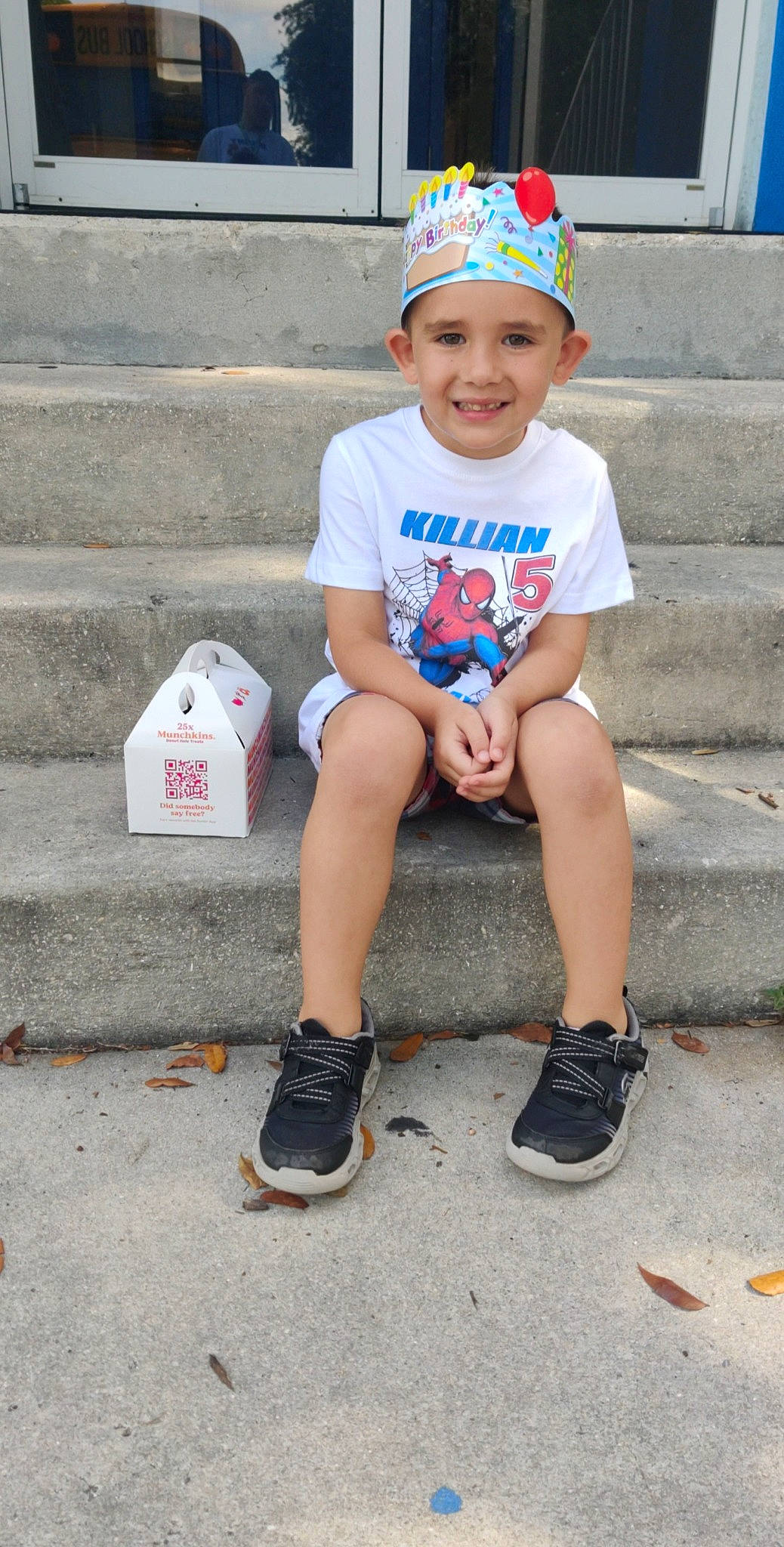 Killian joined the competition — help win amazing prizes! asphalt, baseball_cap, blue, cap, carmine, child, electric_blue, fashion_accessory, fun, happy, headwear, human_leg, joy, leisure, person, photograph, recreation, sitting, sleeve, smile