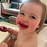 Ellie joined the competition — help win amazing prizes! baby, child, high_chair, popsicle, messy_face, happy, smile, rosy_cheeks, indoor, living_room, furniture, person, cute, toddler, food, eating, hand, skin, young_child, playful