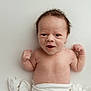 baby, newborn, infant, smiling, arms, flexing, hair, blanket, white, skin, cute, portrait, lying_down, expression, young, child, happy, face, person, toddler