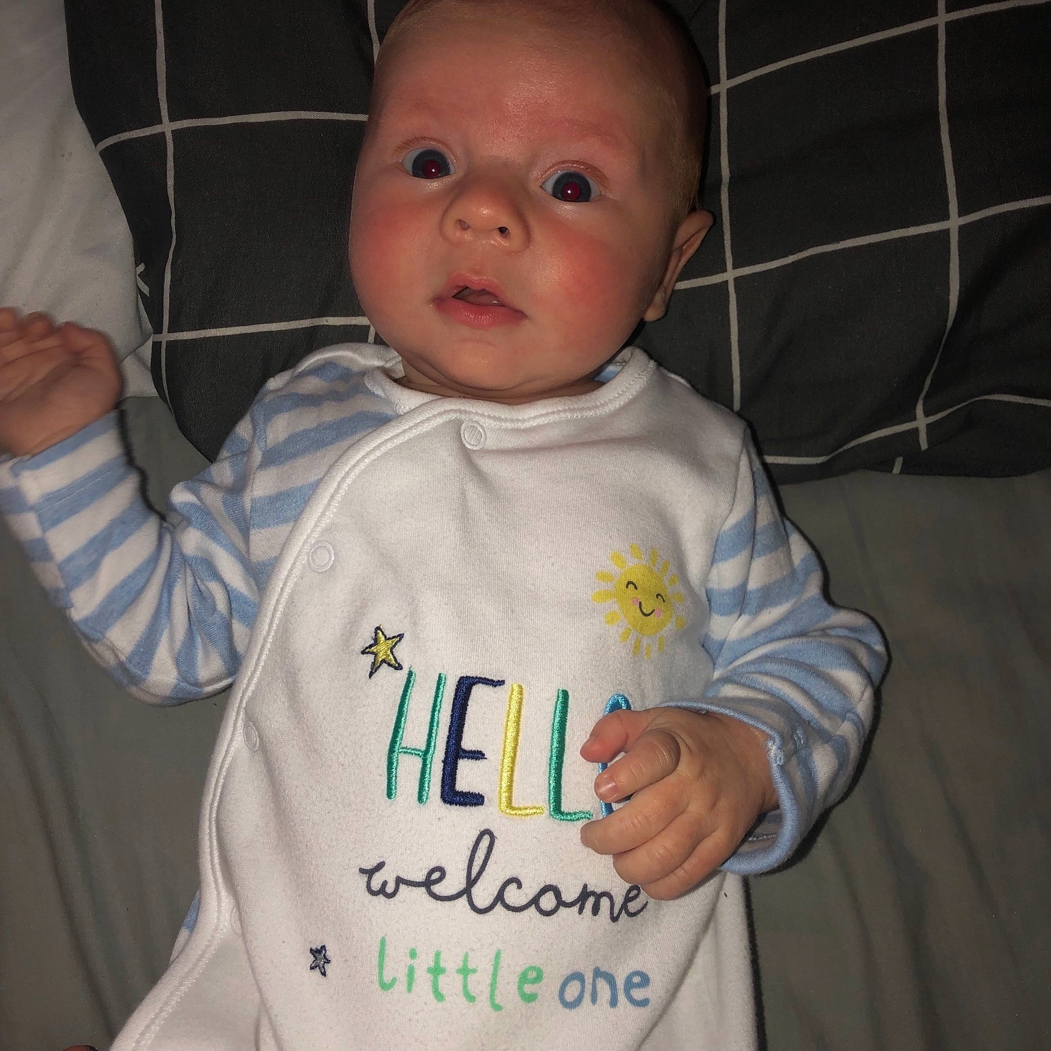 Theo joined the competition — help win amazing prizes! baby, baby_toddler_clothing, cheek, child, cool, finger, outerwear, person, product, sleeve, smile, t_shirt, toddler