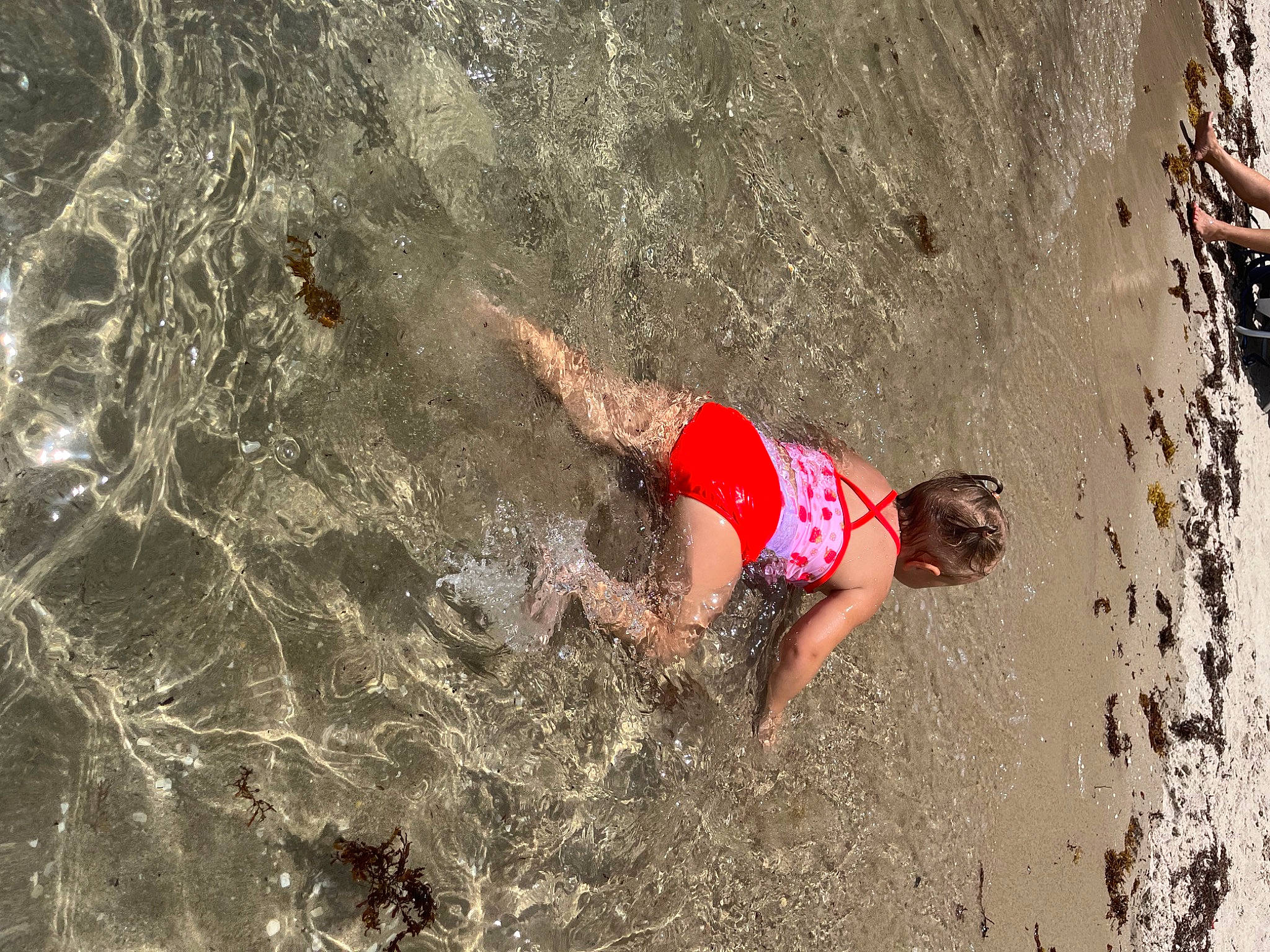 Chloe is registered to the contest to win money with this photo: adventure, beach, coast, competition, competition_event, extreme_sport, fun, human_leg, landscape, leisure, mud, play, recreation, rock, sand, shorts, soil, sports, swimwear, thigh