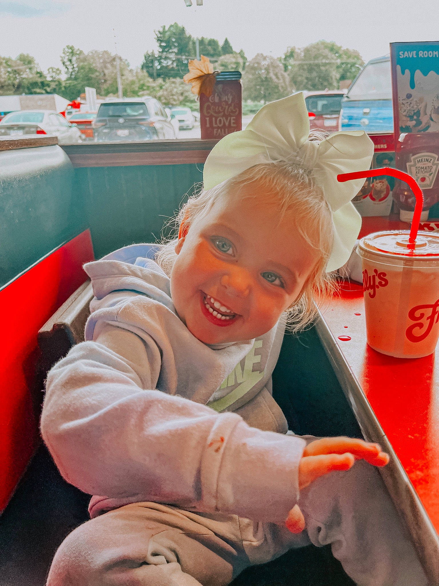 Wyllow joined the competition — help win amazing prizes! car, child, event, family_car, fun, happy, joy, leisure, luxury_vehicle, motor_vehicle, person, recreation, sitting, sky, smile, sunglasses, table, tableware, toddler, tree