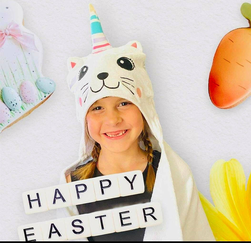 Ella joined the competition — help win amazing prizes! art, cap, cone, costume, costume_hat, design, event, fashion_accessory, font, fun, fur, happy, headgear, headwear, joy, party_hat, party_supply, peach, person, pink