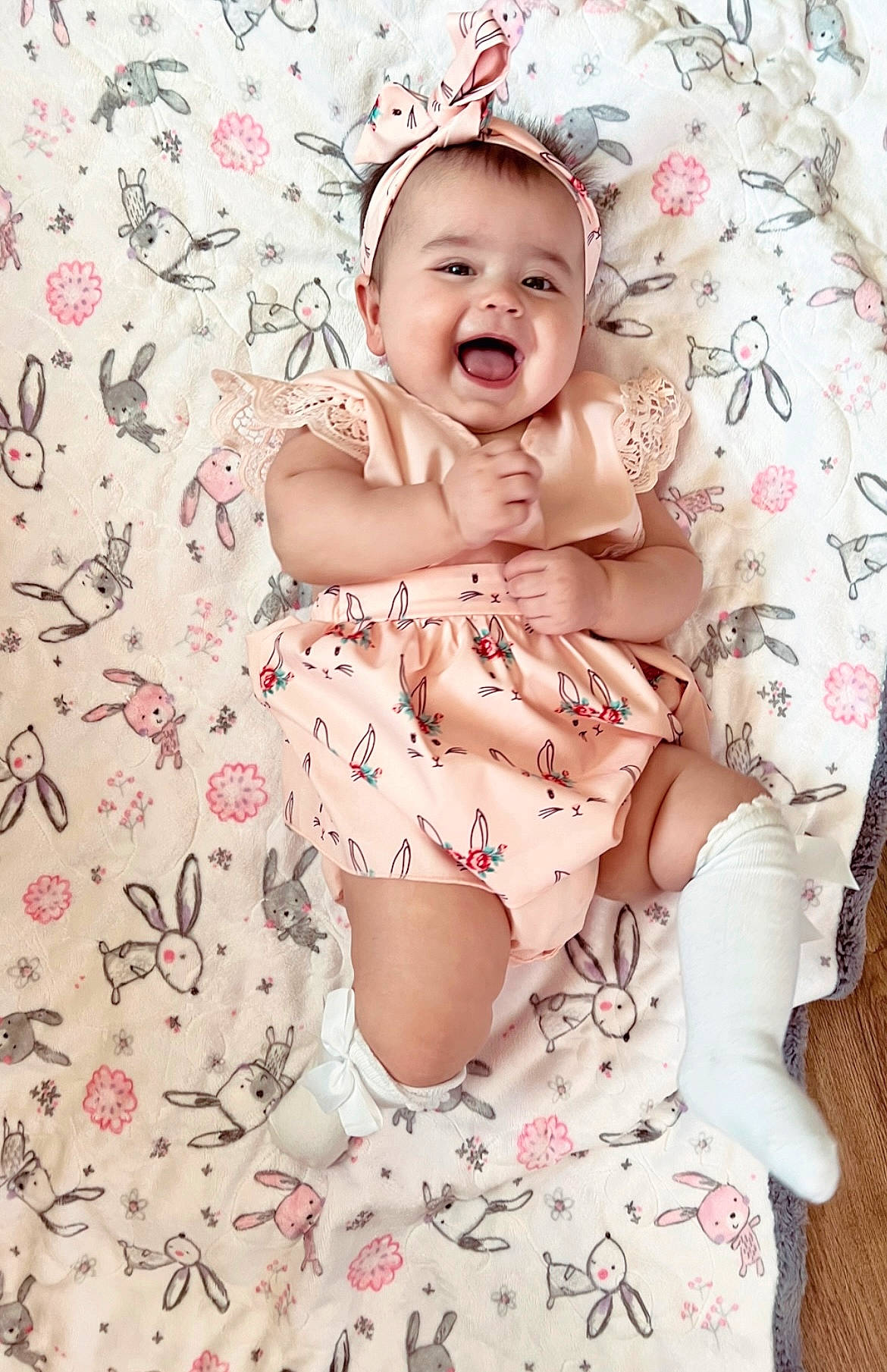 Kora joined the competition — help win amazing prizes! baby, baby_toddler_clothing, child, fashion_accessory, flash_photography, fun, happy, headgear, human_leg, linens, magenta, pattern, person, pink, portrait_photography, sitting, skin, sleeve, smile, thigh