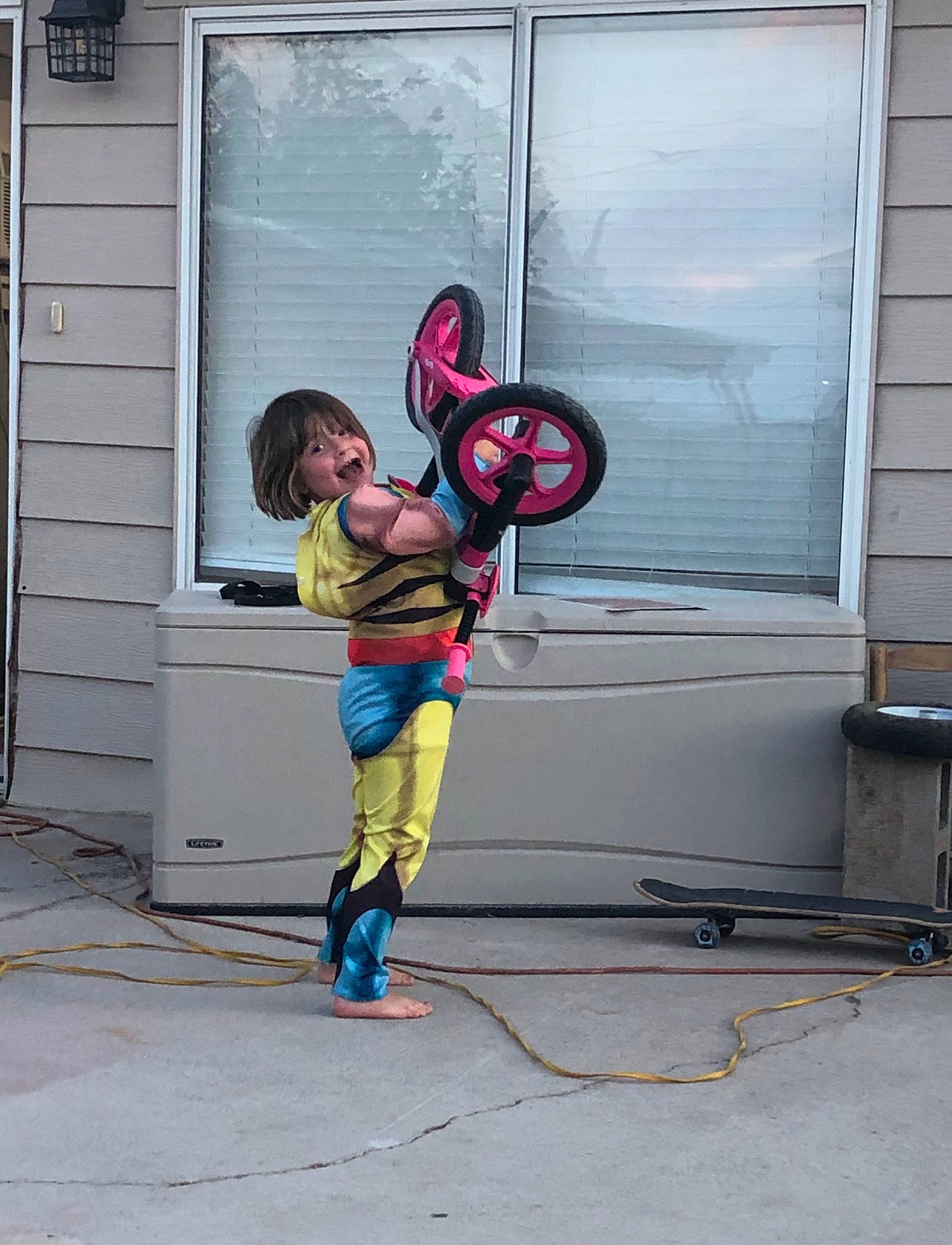 Prudence is registered to the contest to win money with this photo: costume, fictional_character, person, superhero, wheel