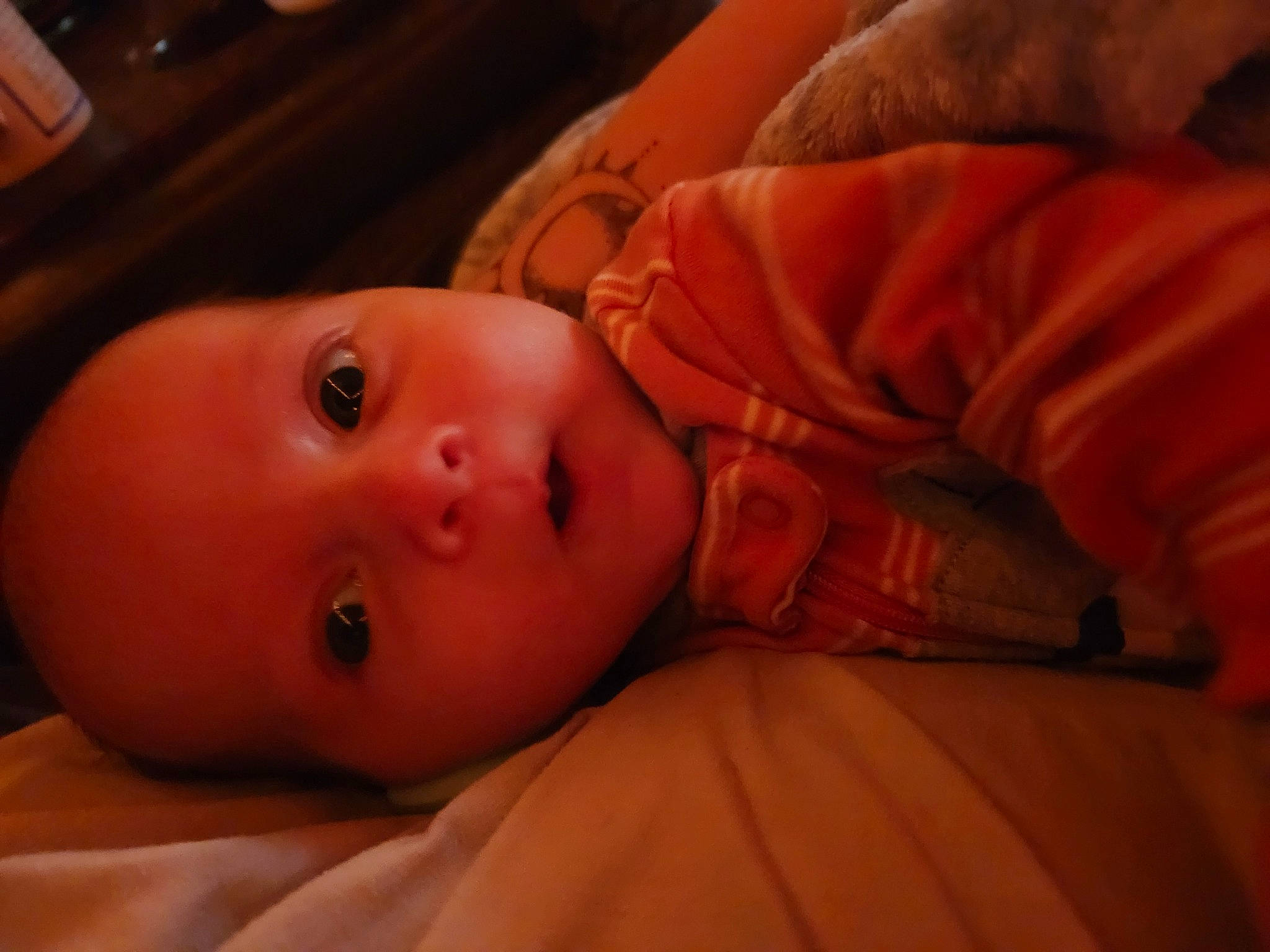 Kaeden is registered to the contest to win money with this photo: baby, baby_toddler_clothing, bedtime, brown, cheek, child, comfort, eyelash, flooring, fun, fur, iris, lip, mouth, nose, orange, person, room, skin, toddler