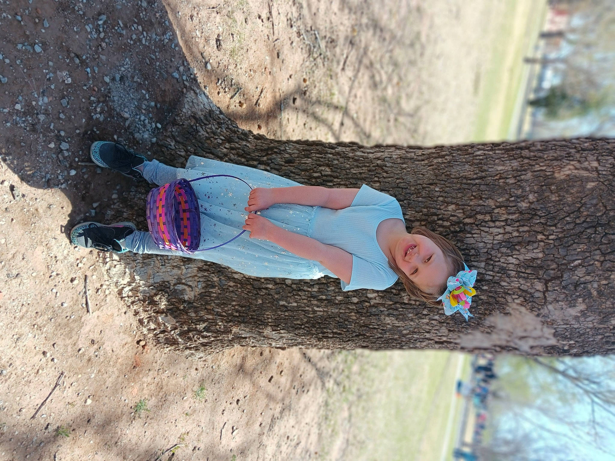 Daisy Mae Ann is registered to the contest to win money with this photo: adventure, electric_blue, fun, geology, joy, landscape, leg, leisure, people_in_nature, person, plant, recreation, rock, sand, shadow, slope, soil, toddler, tree, trunk