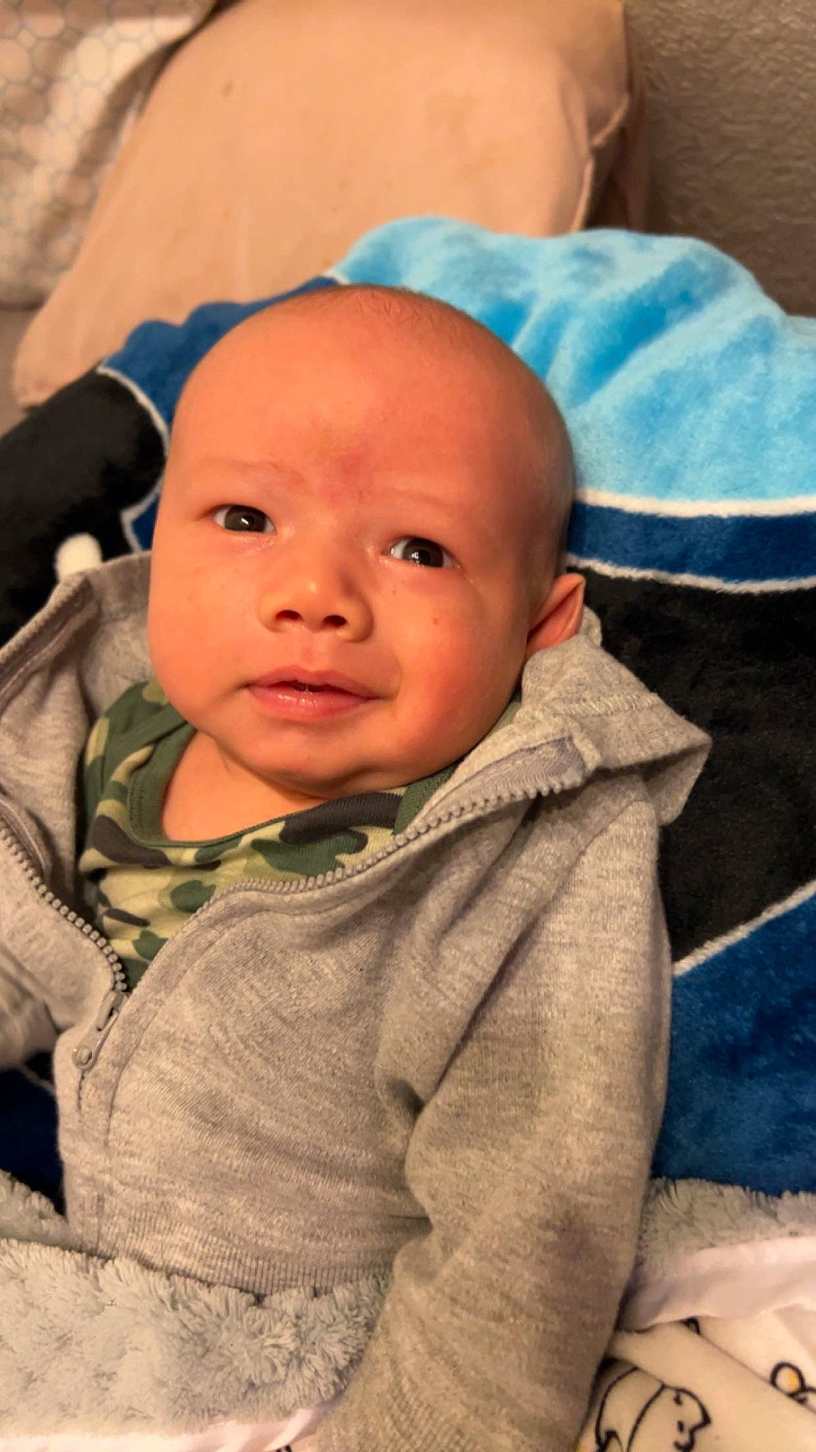 Atlas joined the competition — help win amazing prizes! baby, baby_toddler_clothing, cheek, child, chin, comfort, eye, eyebrow, fun, happy, iris, linens, mouth, nose, person, polar_fleece, sitting, skin, sleeve, textile