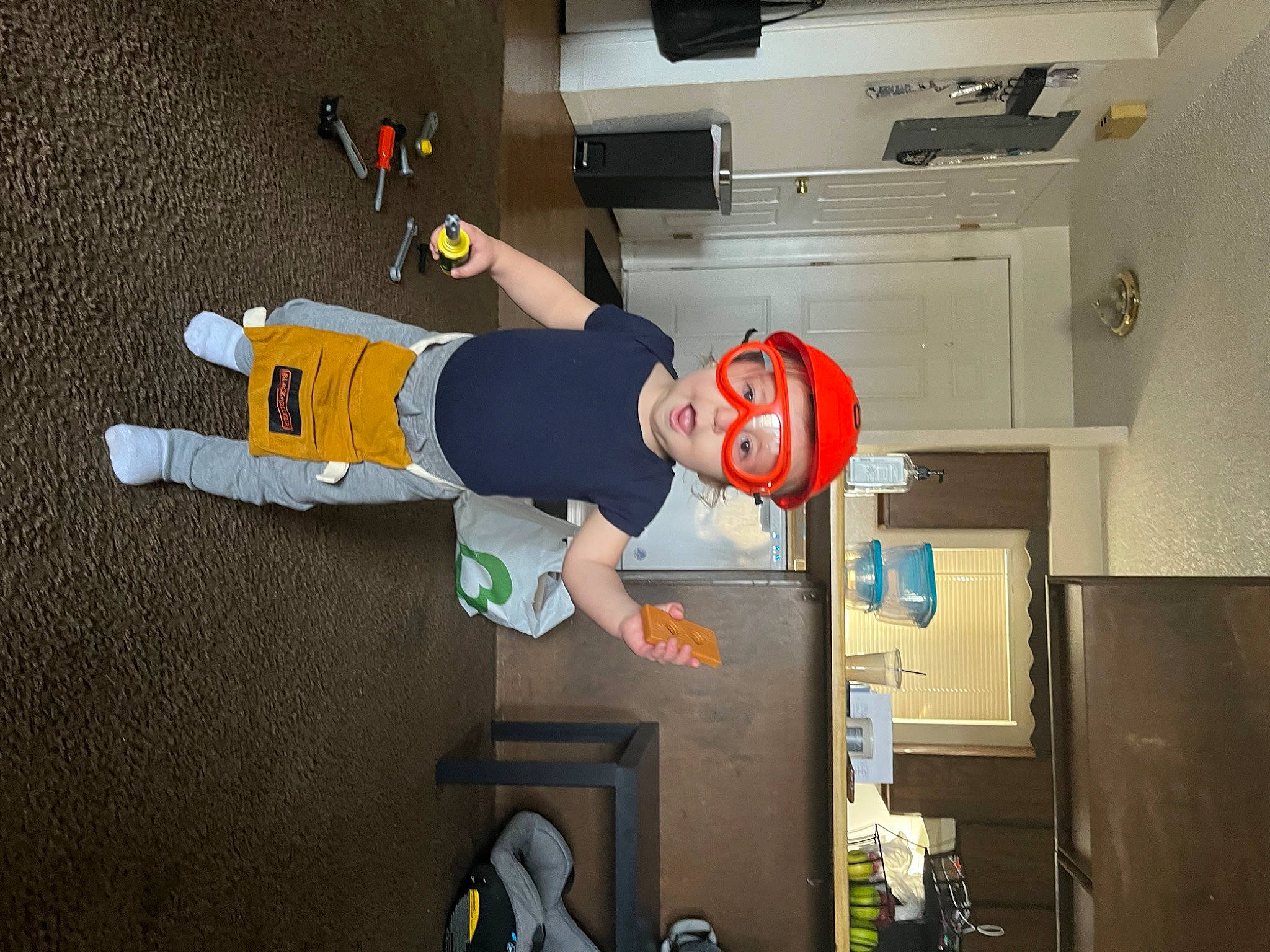 Christopher is registered to the contest to win money with this photo: cleanliness, cooking, elbow, engineering, fun, gas, headwear, machine, person, room, smile, space, t_shirt