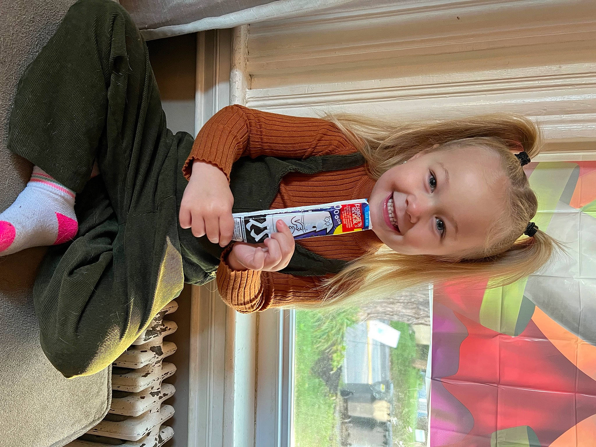 Remi joined the competition — help win amazing prizes! child, door, fun, happy, human_leg, joy, knee, pattern, person, plant, sitting, smile, thigh, toddler, tree, vacation, window, wood, wrist