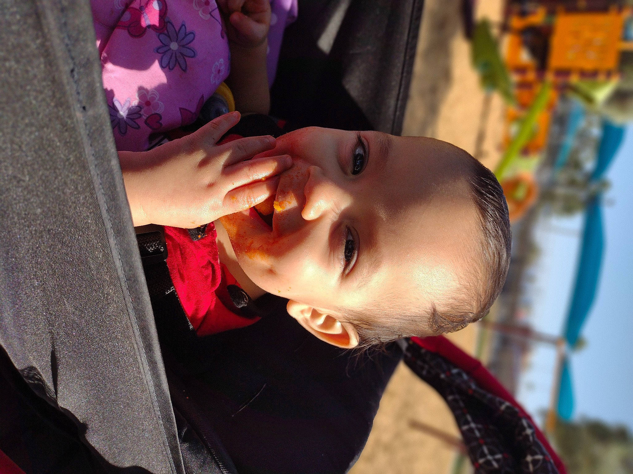 Emmitt is registered to the contest to win money with this photo: baby, black_hair, child, ear, eyelash, eyewear, fashion_accessory, fun, grass, happy, hat, joy, leisure, lip, magenta, mouth, nose, person, smile, toddler
