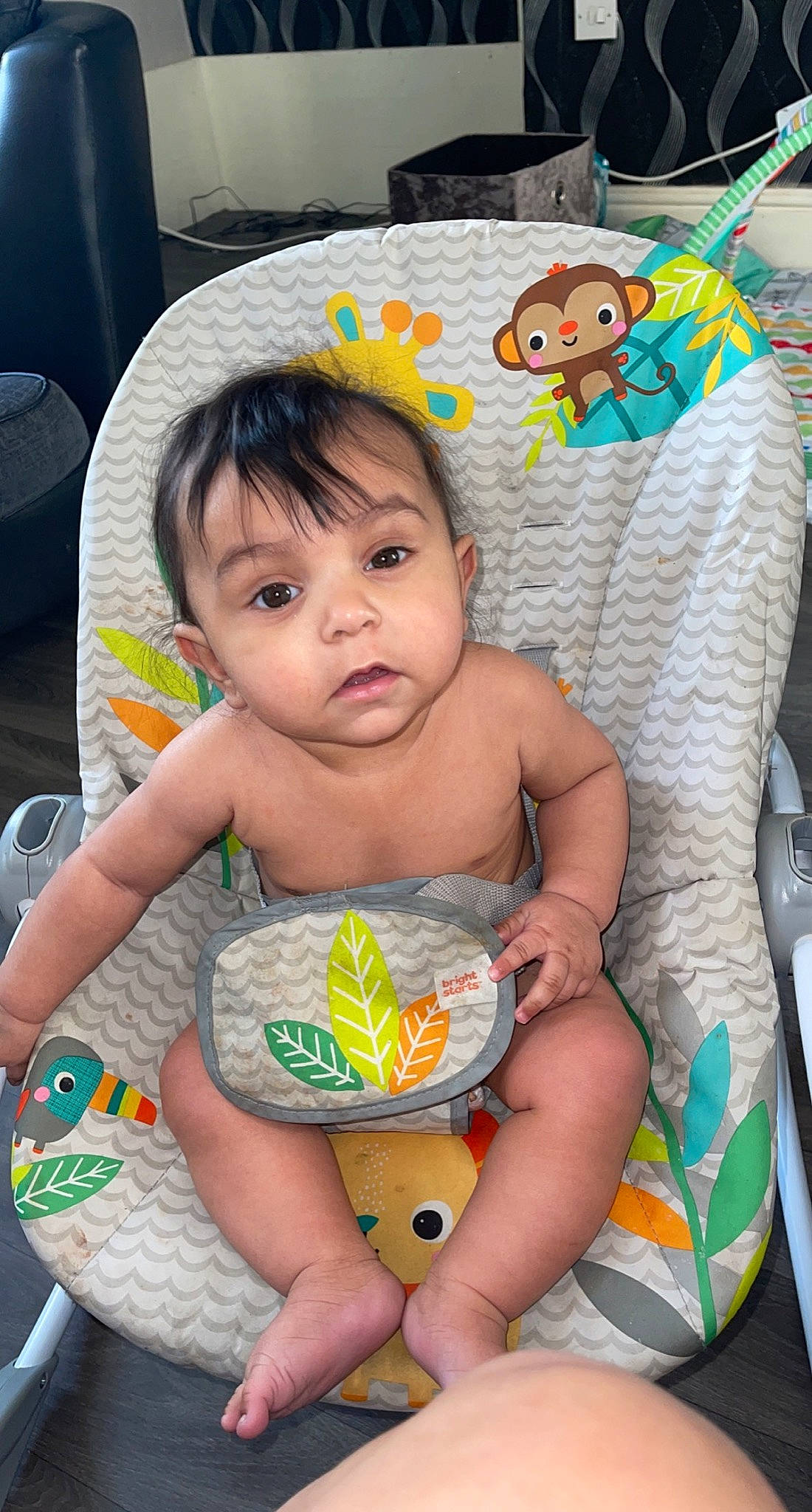Hakeem is registered to the contest to win money with this photo: baby, baby_toddler_clothing, bib, chair, cheek, chest, child, comfort, eye, finger, happy, head, iris, leg, mouth, nose, person, skin, stomach, thigh