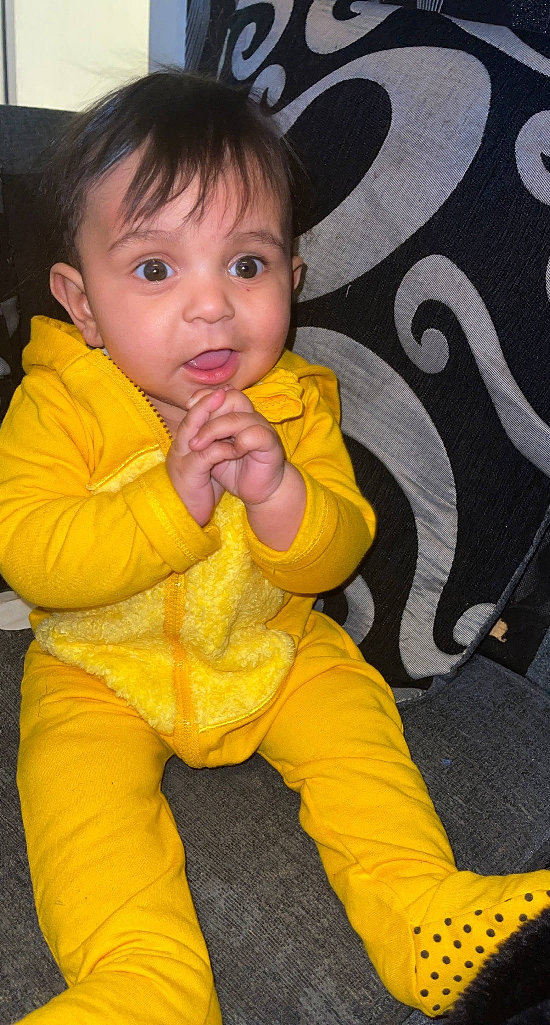 Hakeem joined the competition — help win amazing prizes! baby_toddler_clothing, black, cheek, chin, eye, face, facial_expression, finger, fun, gesture, hairstyle, hand, happy, head, iris, nose, person, skin, sleeve, thumb