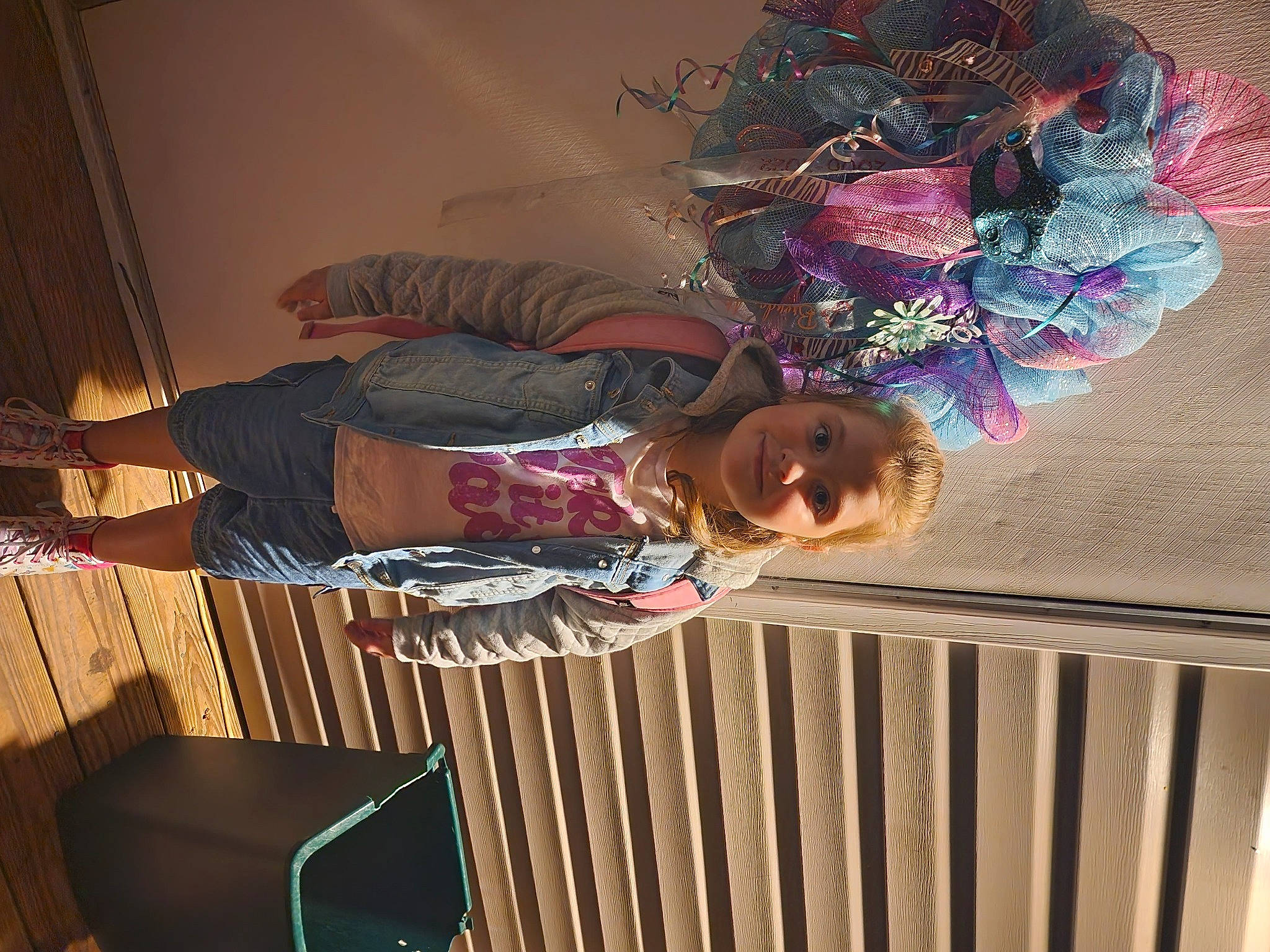 Layken joined the competition — help win amazing prizes! ceiling, child, cut_flowers, flower, fun, hardwood, joy, magenta, pattern, person, plant, room, smile, toddler, tree, wood