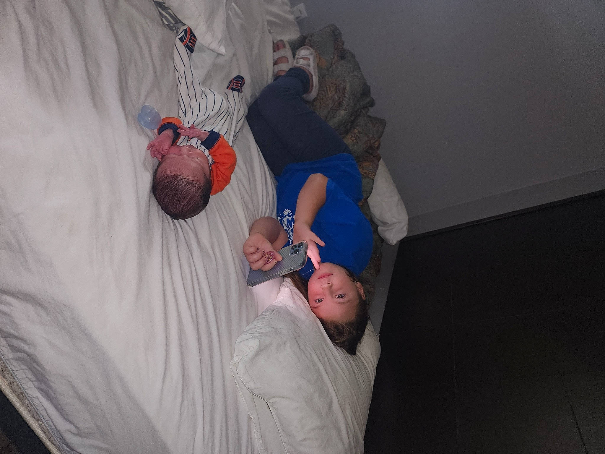 Layken joined the competition — help win amazing prizes! abdomen, bed, child, comfort, elbow, event, finger, flash_photography, fun, gesture, grey, joint, knee, leg, leisure, person, room, shoulder, sitting, t_shirt