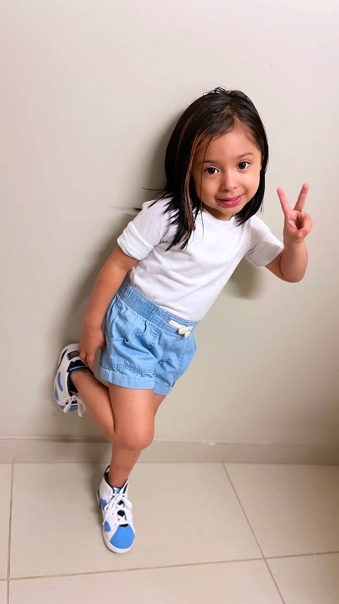 Aaliyah joined the competition — help win amazing prizes! arm, black_hair, elbow, finger, flash_photography, gesture, happy, human_body, joint, joy, knee, leg, person, shorts, shoulder, skin, sleeve, smile, sneakers, t_shirt