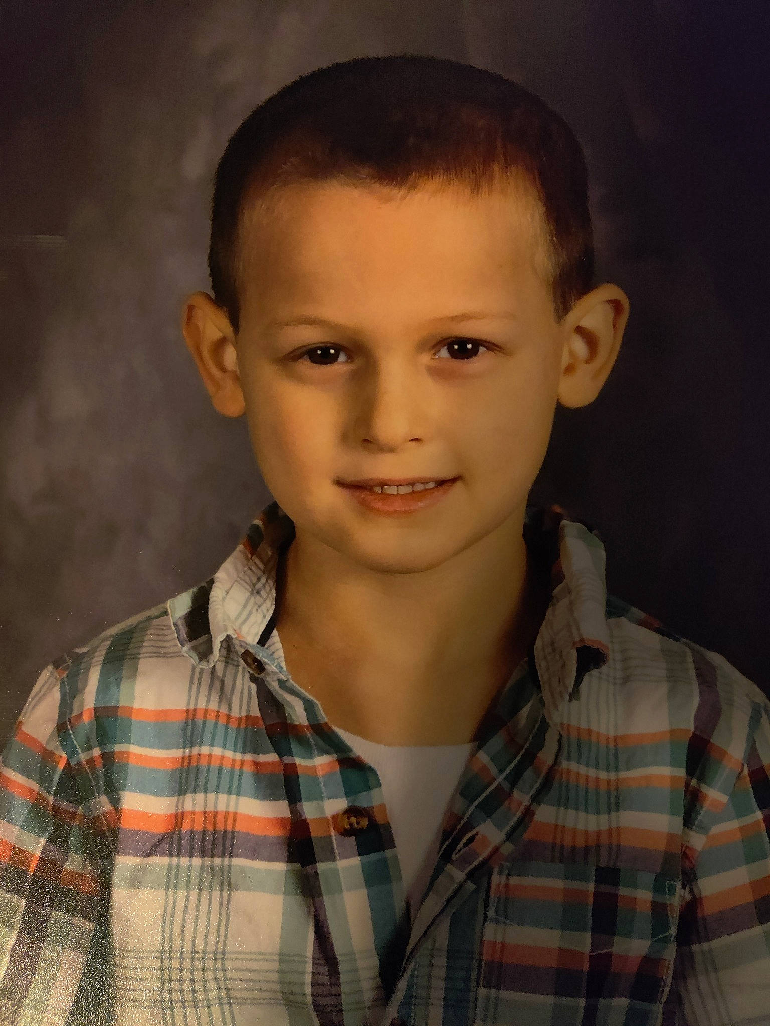 Jayden is registered to the contest to win money with this photo: button, caesar_cut, cheek, chin, collar, dress_shirt, eyebrow, fashion, flash_photography, forehead, happy, iris, jaw, joy, lip, nose, pattern, person, plaid, sleeve