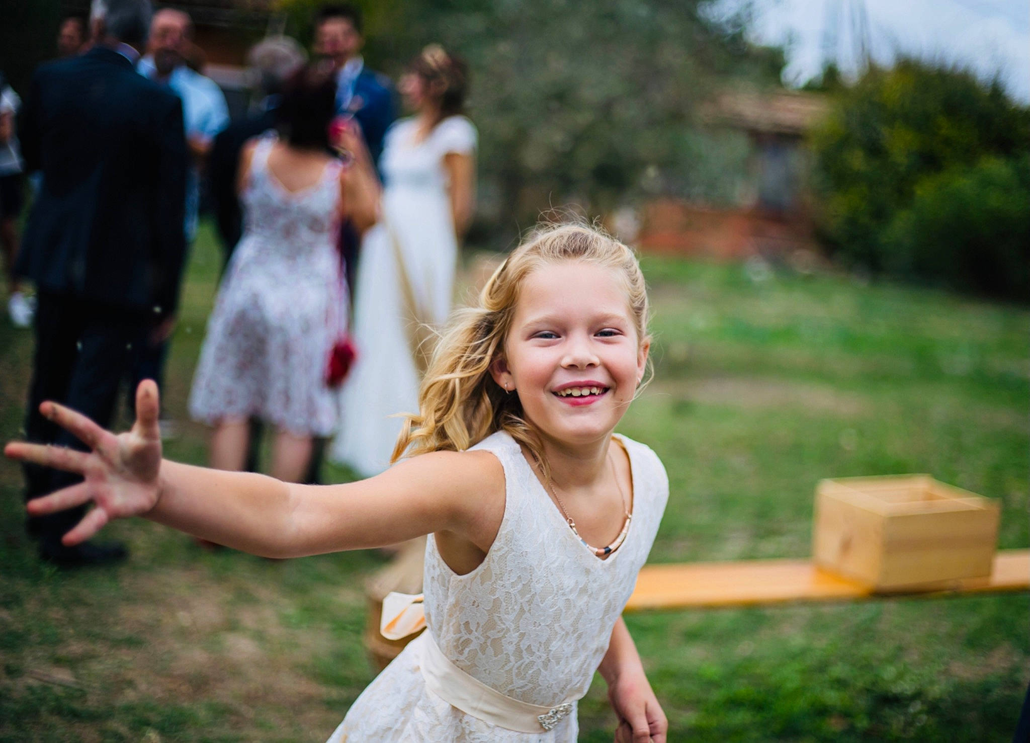 Taïna participe au concours pour gagner de l'argent avec cette photo : bridal_clothing, child, community, dress, facial_expression, flash_photography, formal_wear, fun, gesture, grass, happy, interaction, joy, lawn, leisure, people_in_nature, person, plant, recreation, smile