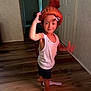 Roman joined the competition — help win amazing prizes! child, boy, hat, orange_hat, pom_pom, tank_top, shorts, barefoot, wooden_floor, hallway, door, indoor, motion_blur, playful, young_child, person, smiling, light, shadow, floor_mat