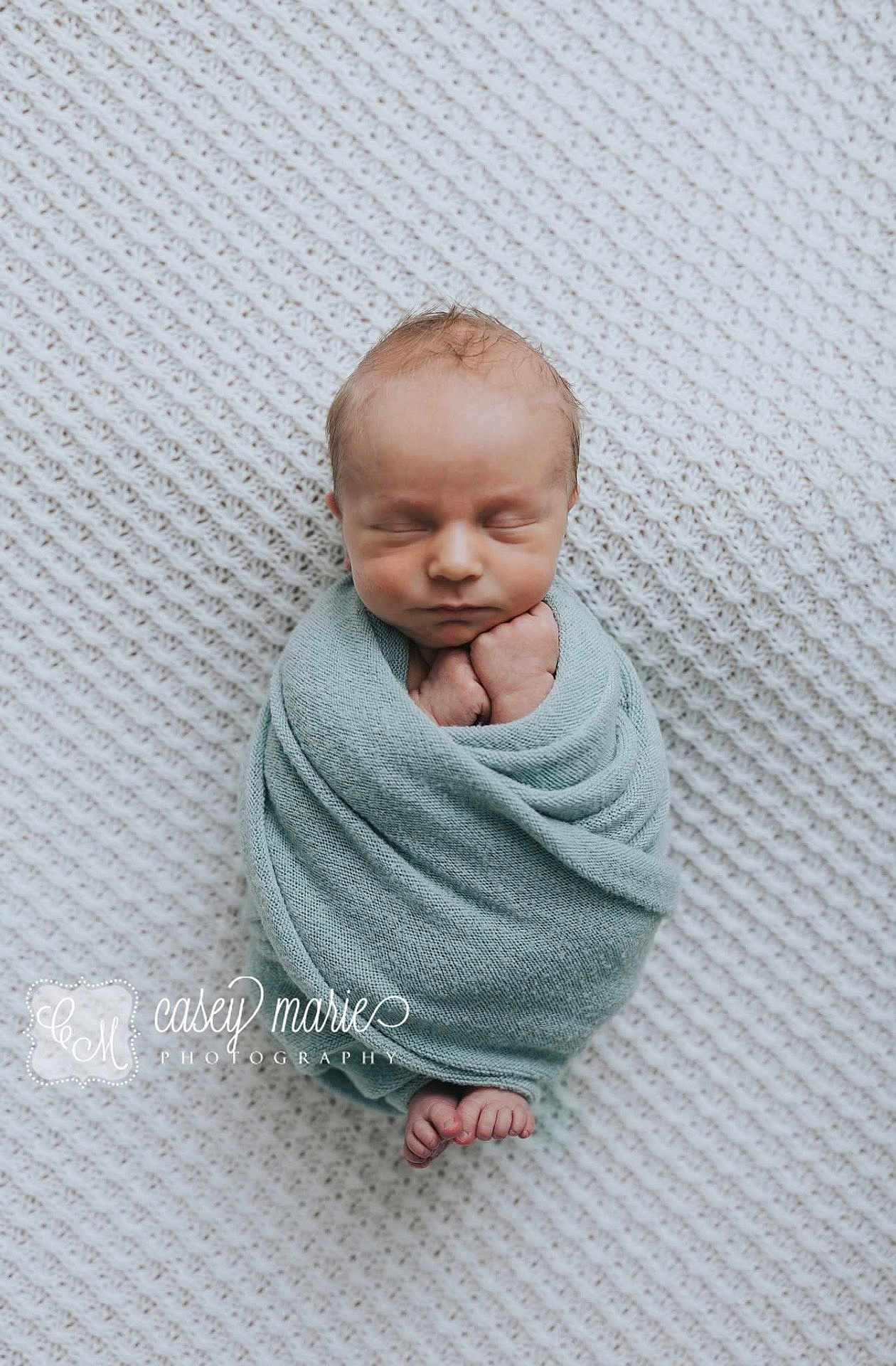 Stetson-Alan is registered to the contest to win money with this photo: newborn, baby, swaddled, blanket, sleeping, infant, wrapped, soft_texture, peaceful, portrait, foot, hand, head, photography, studio, white_background, cozy, cute, human, resting