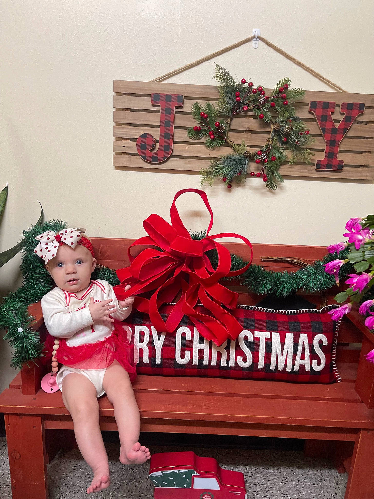 Harlow joined the competition — help win amazing prizes! christmas, christmas_decoration, christmas_eve, christmas_ornament, event, evergreen, font, green, headwear, holiday, holiday_ornament, interior_design, ornament, person, plant, rectangle, red, thigh, tree, twig