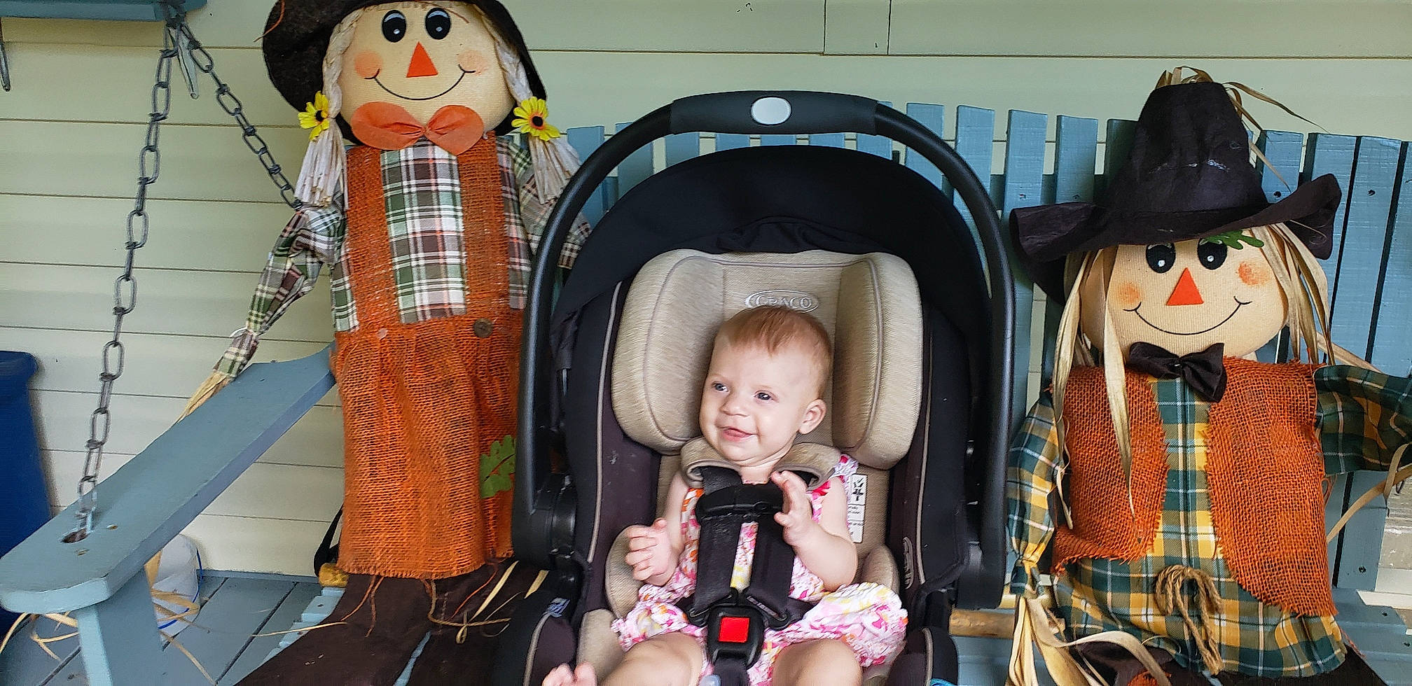 Harlow is registered to the contest to win money with this photo: chair, child, doll, event, facial_expression, fun, hairstyle, happy, hat, head, joy, leisure, person, product, room, smile, snapshot, sun_hat, tartan, toddler