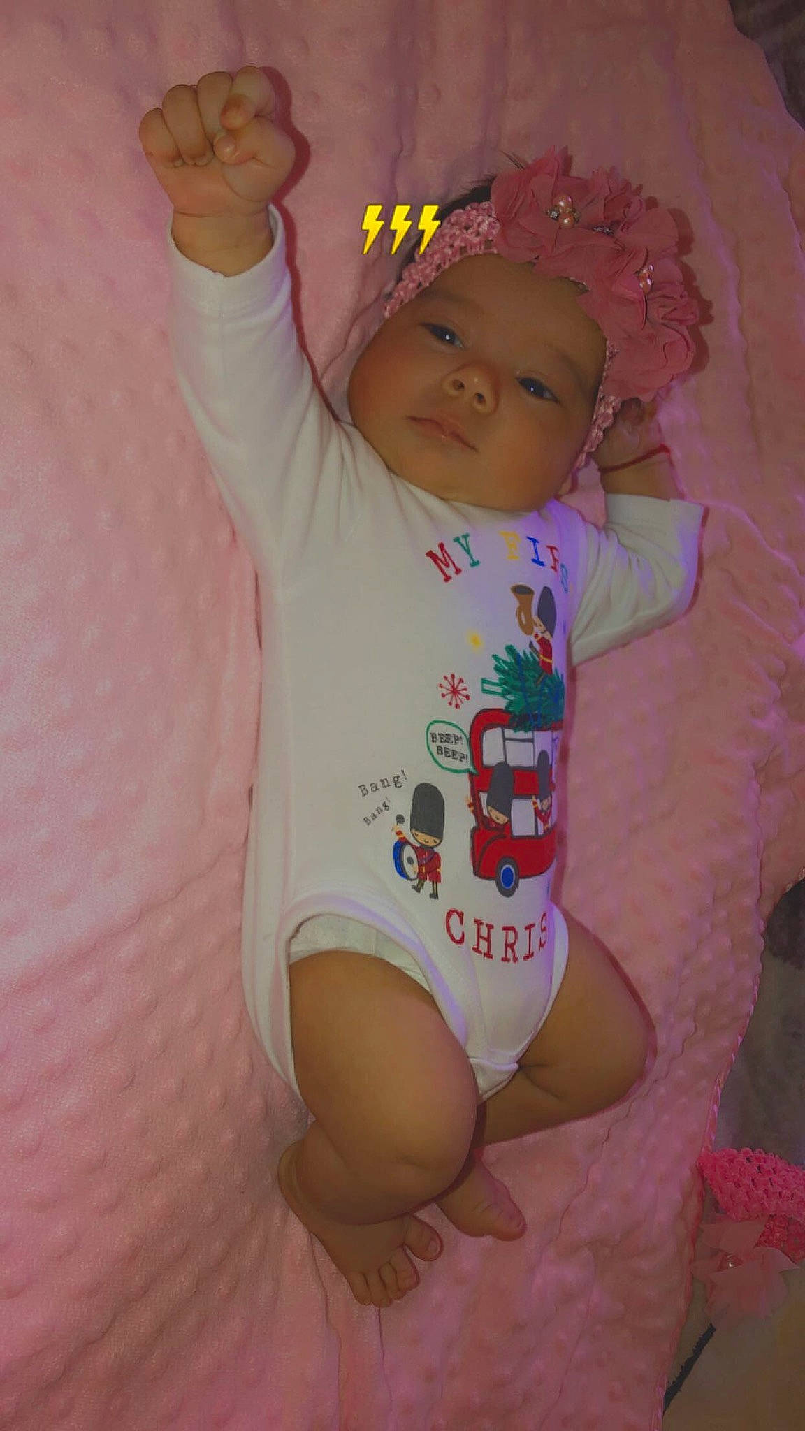 Celine is registered to the contest to win money with this photo: baby, baby_toddler_clothing, cheek, eye, finger, gesture, hairstyle, happy, headwear, human_body, lip, mouth, neck, nose, person, pink, skin, sleeve, smile, t_shirt