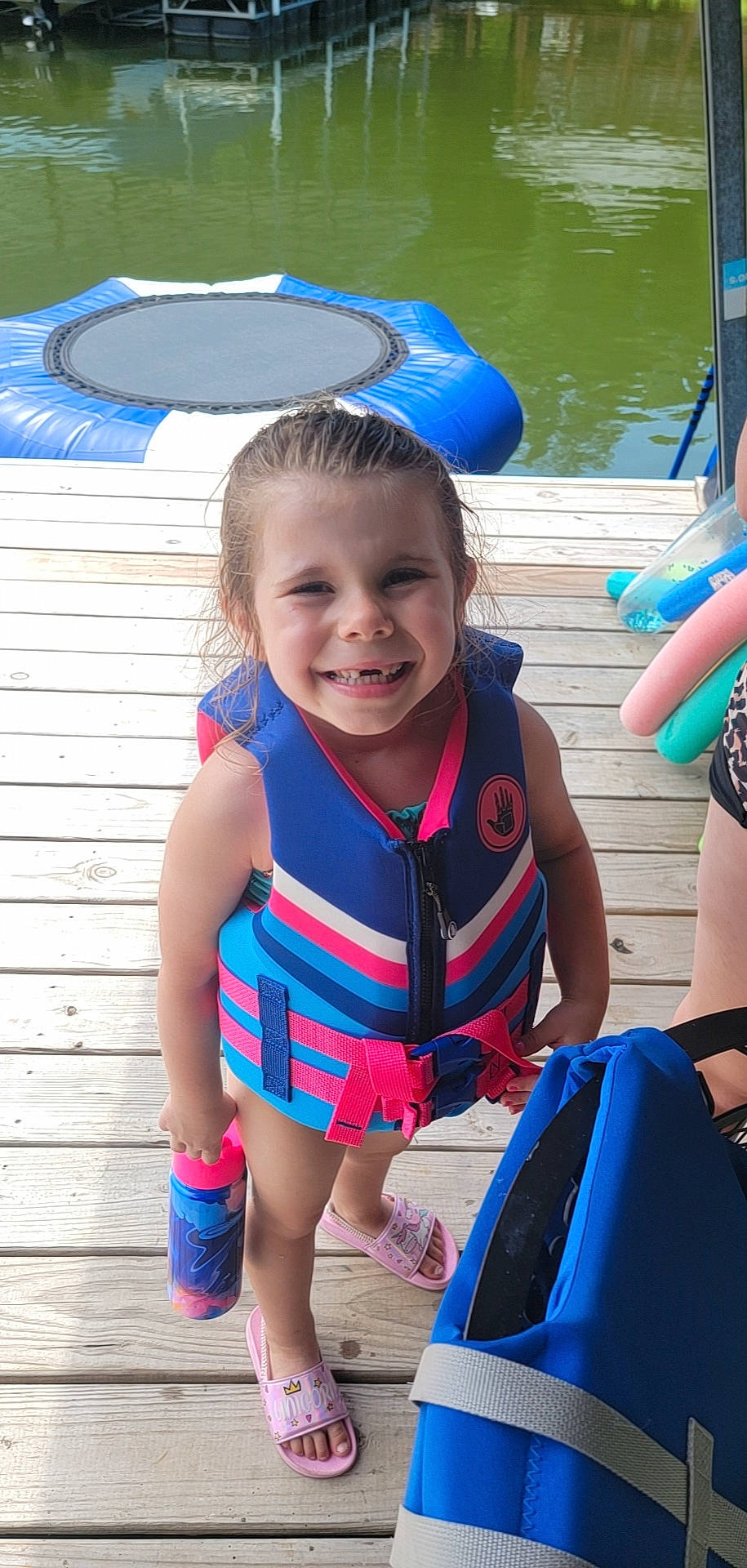Skylynn is registered to the contest to win money with this photo: azure, baby_products, baby_toddler_clothing, bag, blue, child, electric_blue, fun, happy, joy, leisure, lifejacket, luggage_and_bags, person, personal_protective_equipment, play, recreation, smile, toddler, vacation