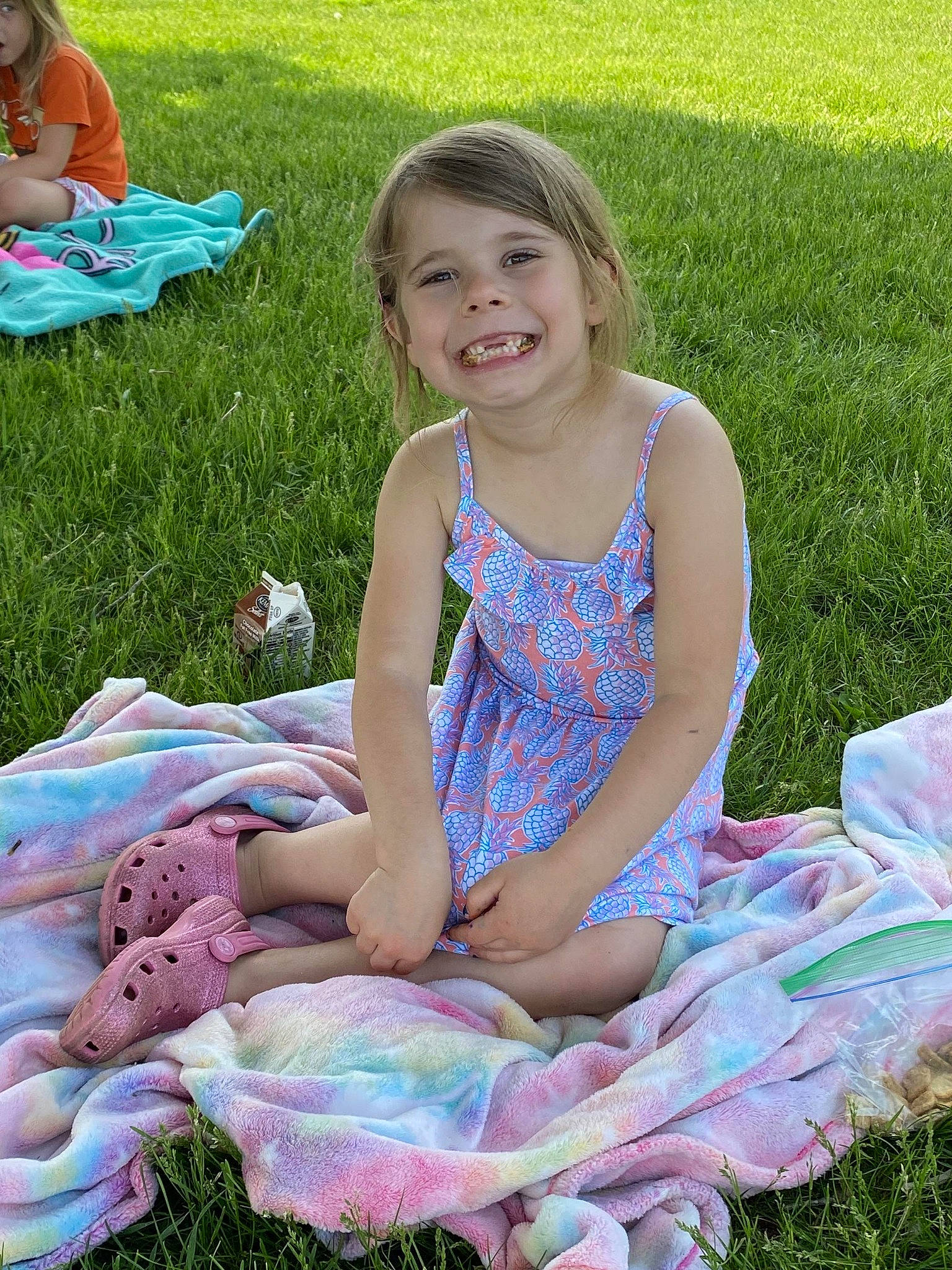 Skylynn is registered to the contest to win money with this photo: baby_toddler_clothing, child, clothing, dress, event, face, fun, grass, grass_family, green, happy, joy, leisure, people_in_nature, person, pink, plant, purple, recreation, smile