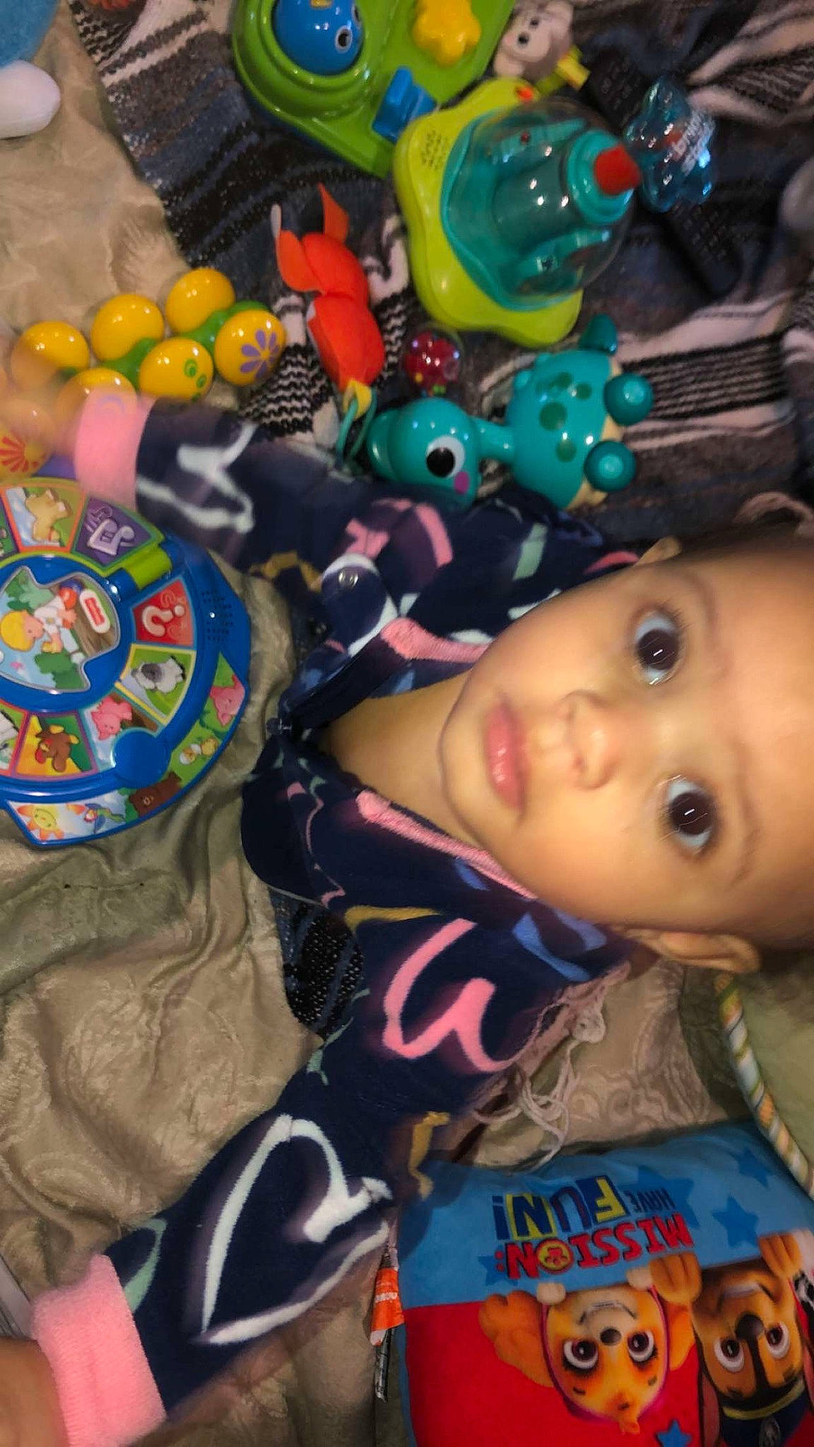 Amiyah is registered to the contest to win money with this photo: baby, baby_toddler_clothing, baby_toys, cheek, child, event, eyelash, fun, party_supply, pattern, person, plastic, play, product, stuffed_toy, toddler, toy, tree