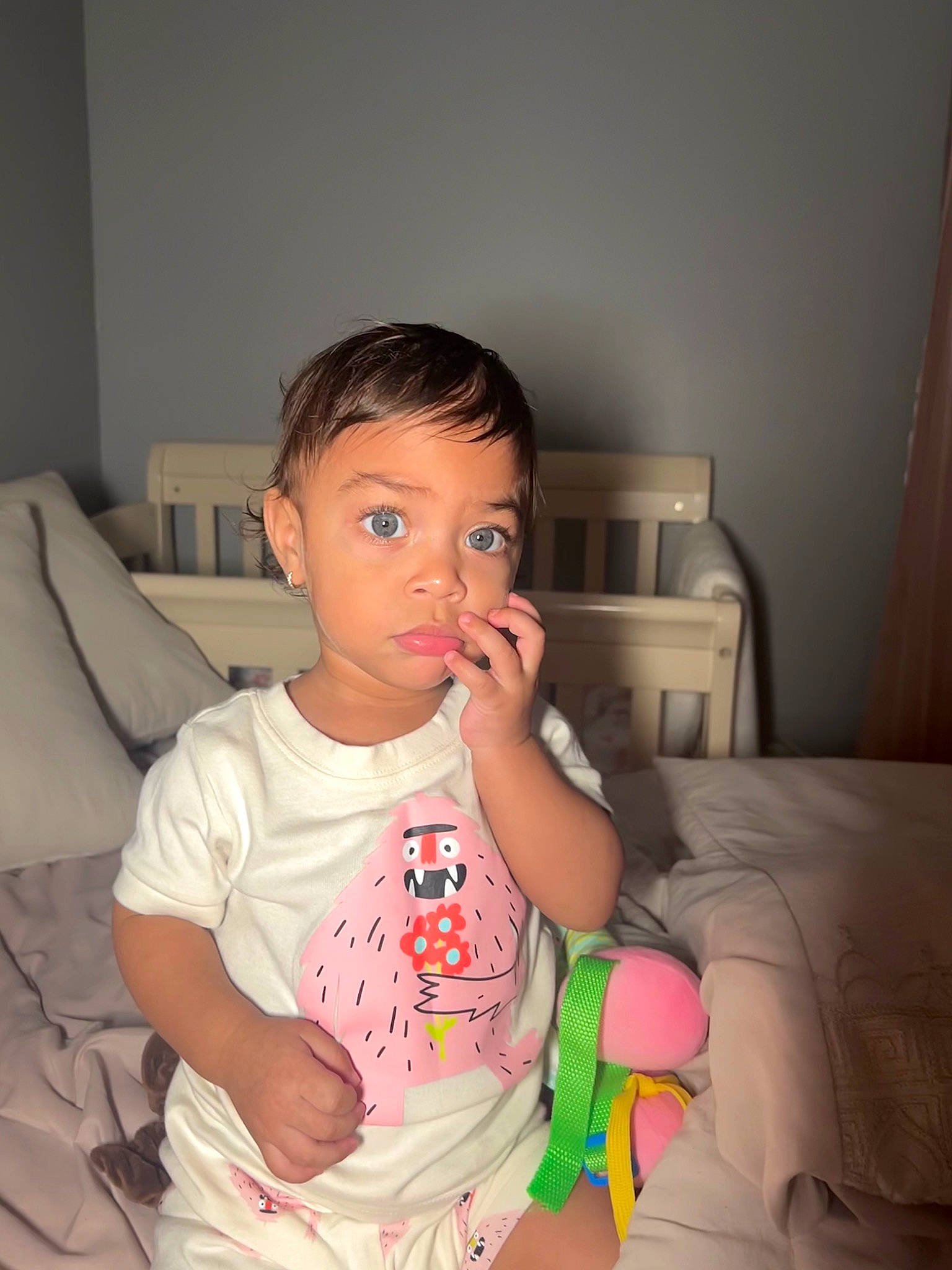 Lunna is registered to the contest to win money with this photo: arm, baby, baby_toddler_clothing, cheek, chin, comfort, eye, eyelash, face, finger, happy, head, iris, lip, mouth, neck, nose, person, skin, thumb