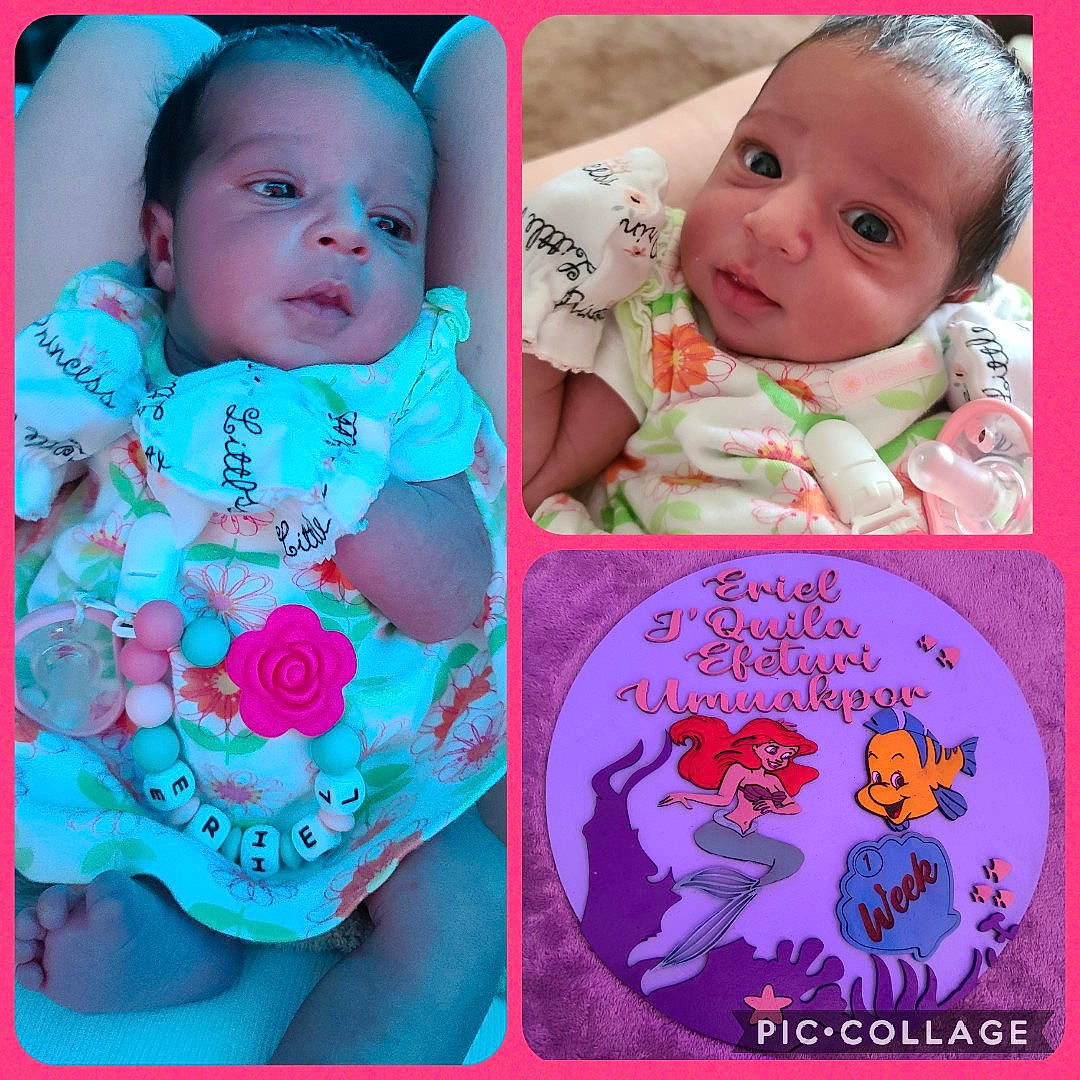 Eriel is registered to the contest to win money with this photo: aqua, art, baby, baby_toddler_clothing, cheek, chin, eyebrow, eyelash, facial_expression, font, happy, iris, nose, outerwear, person, pink, product, skin, sleeve, t_shirt