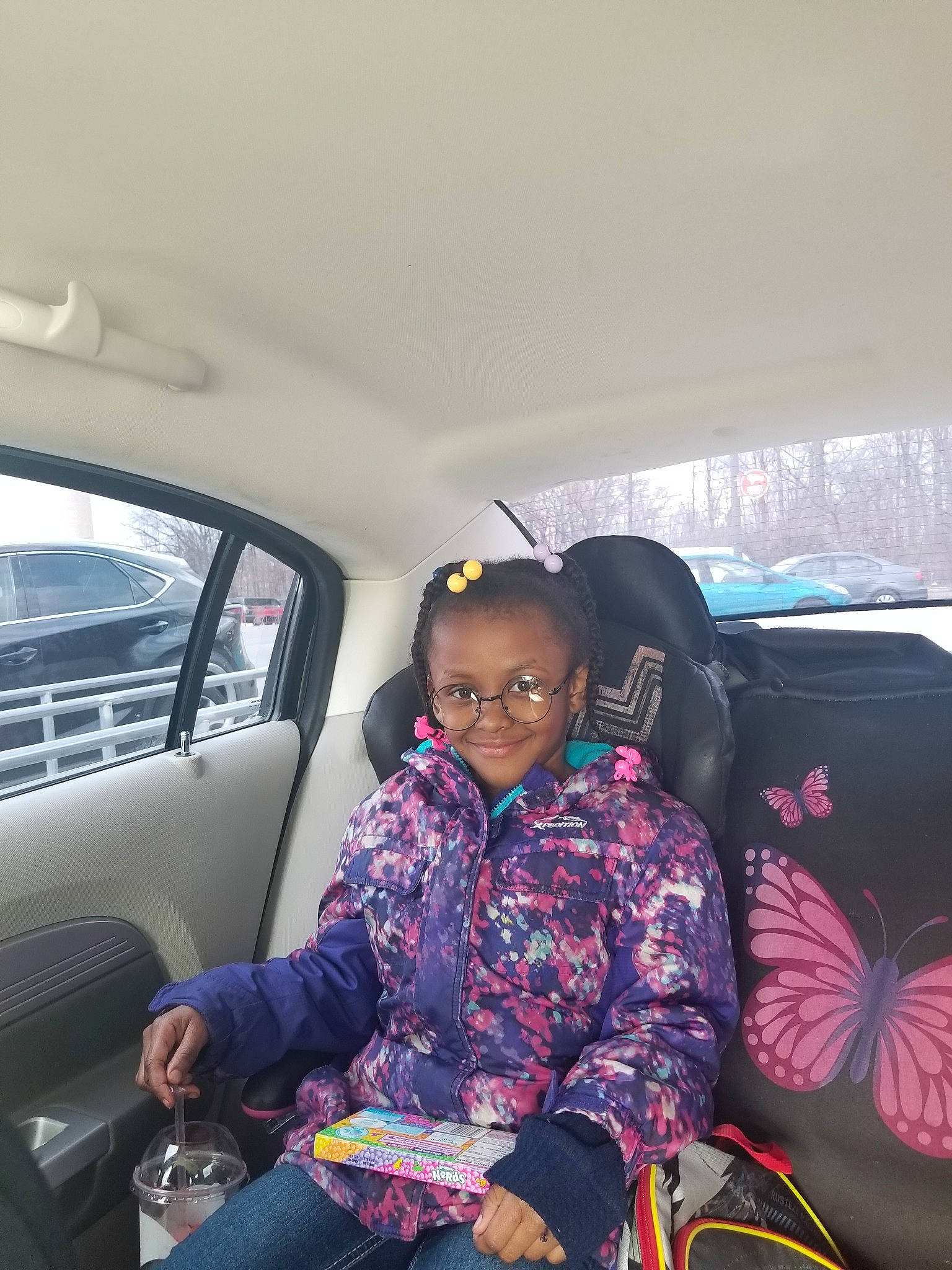 Kimya is registered to the contest to win money with this photo: car, car_seat, child, day, fun, girl, joy, person, product, vehicle