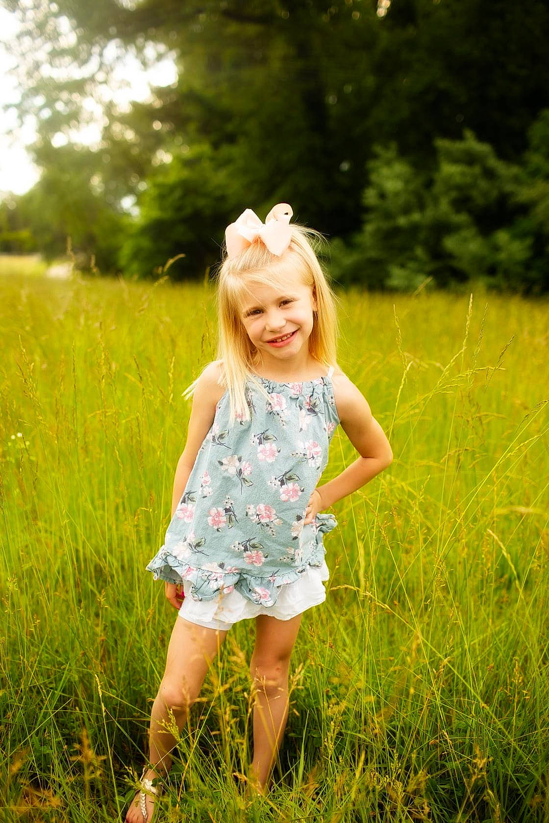 Aleeah is registered to the contest to win money with this photo: child, dress, eye, face, facial_expression, flash_photography, fun, grass, grassland, happy, joy, leaf, meadow, morning, natural_landscape, people_in_nature, person, plant, smile, sunlight