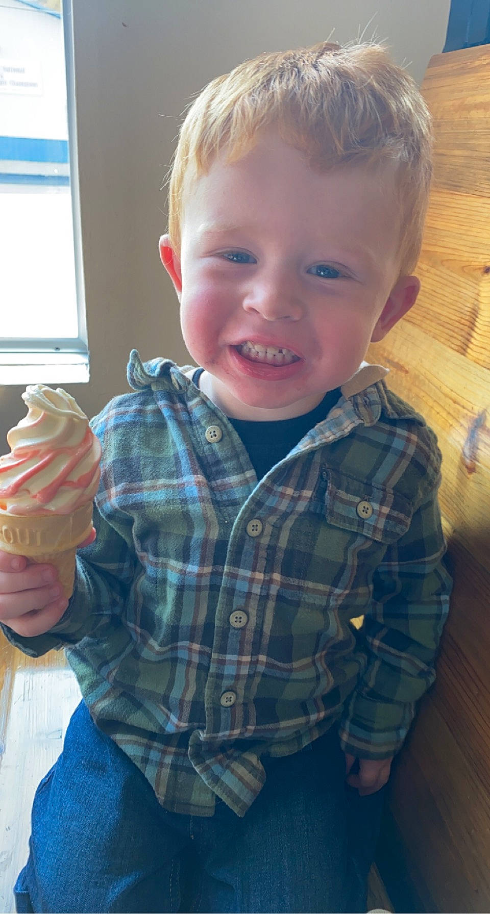 Ryker is registered to the contest to win money with this photo: cheek, chin, dress_shirt, eye, face, facial_expression, gesture, hair, hairstyle, hand, head, human_body, neck, nose, organ, person, skin, sleeve, smile, standing