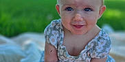 Hazel is registered to the contest to win money with this photo: baby, blanket, child, cute, dress, feet, girl, grass, greenery, hands, happy, headband, infant, nature, outdoor, portrait, sitting, smile, summer, sunlight
