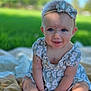 Hazel is registered to the contest to win money with this photo: baby, child, girl, smile, headband, dress, outdoor, grass, blanket, sunlight, portrait, cute, sitting, hands, feet, greenery, nature, happy, infant, summer