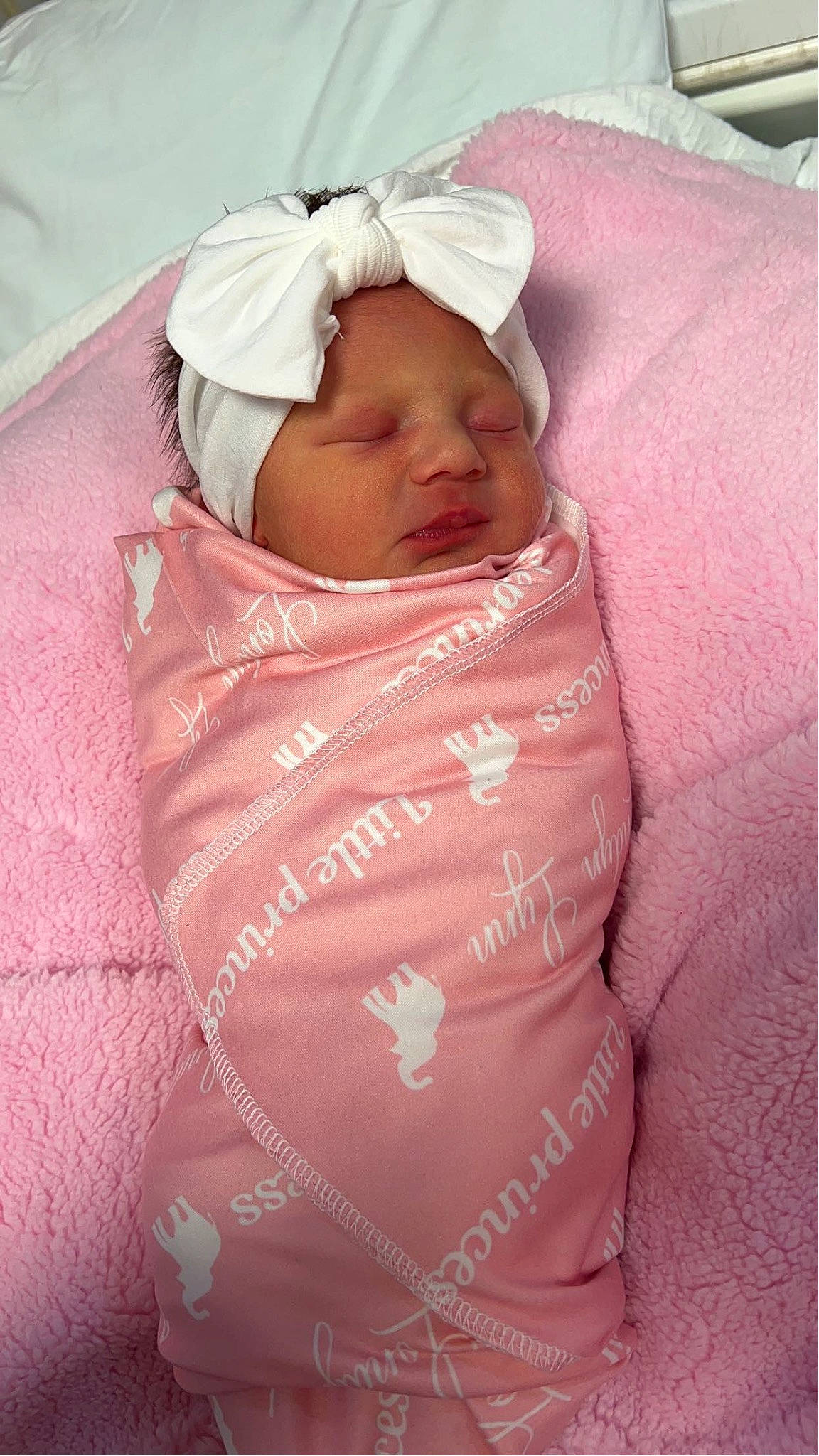 Londyn is registered to the contest to win money with this photo: baby, baby_products, baby_safety, baby_sleeping, baby_toddler_clothing, bedtime, cheek, child, comfort, face, happy, hat, headwear, linens, magenta, person, pink, room, sleeve, smile