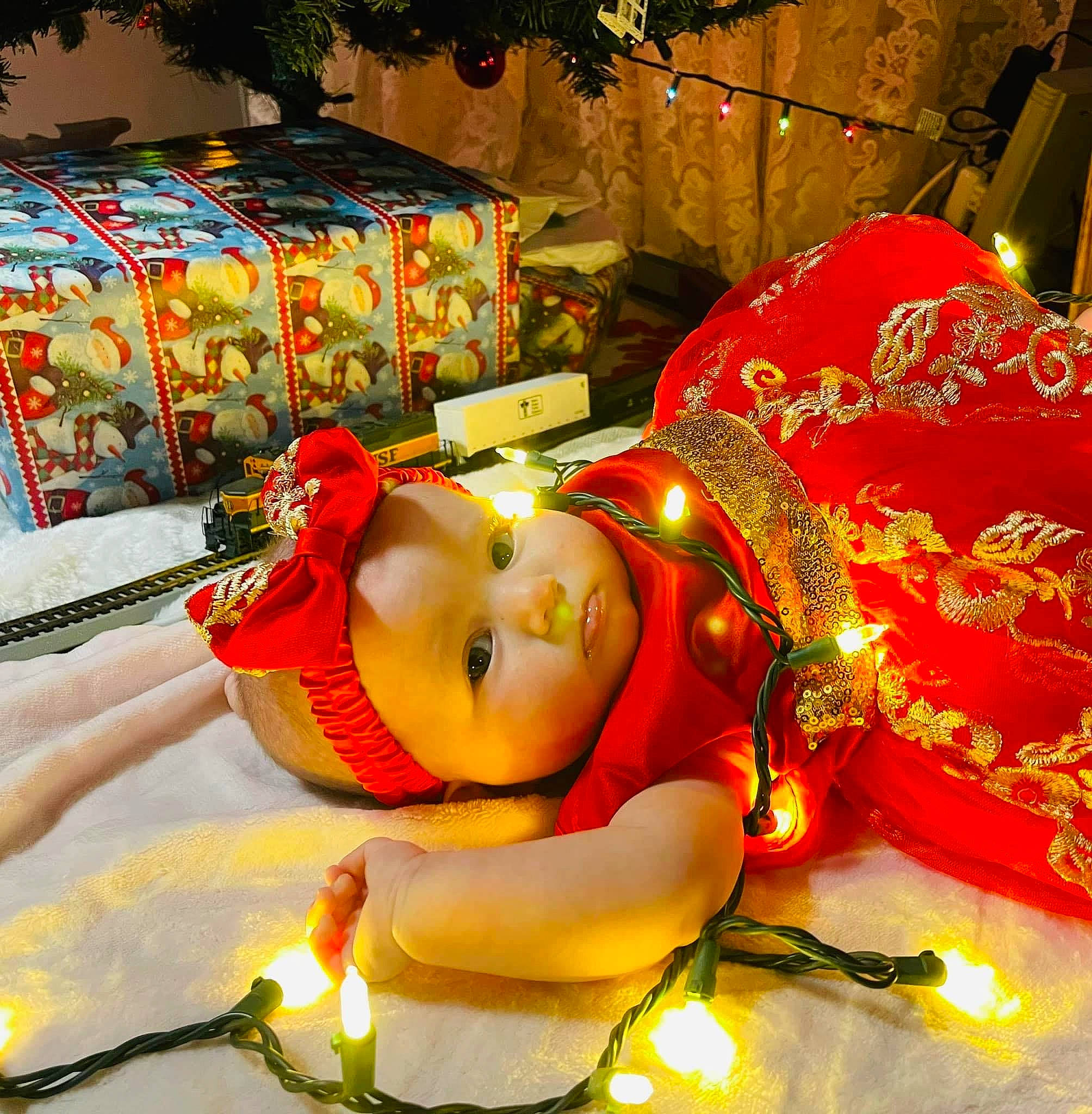 Avaleigh joined the competition — help win amazing prizes! animation, box, carmine, child, christmas, christmas_decoration, christmas_eve, event, fictional_character, fun, headwear, holiday, ornament, person, plant, plush, room, smile, stuffed_toy, textile