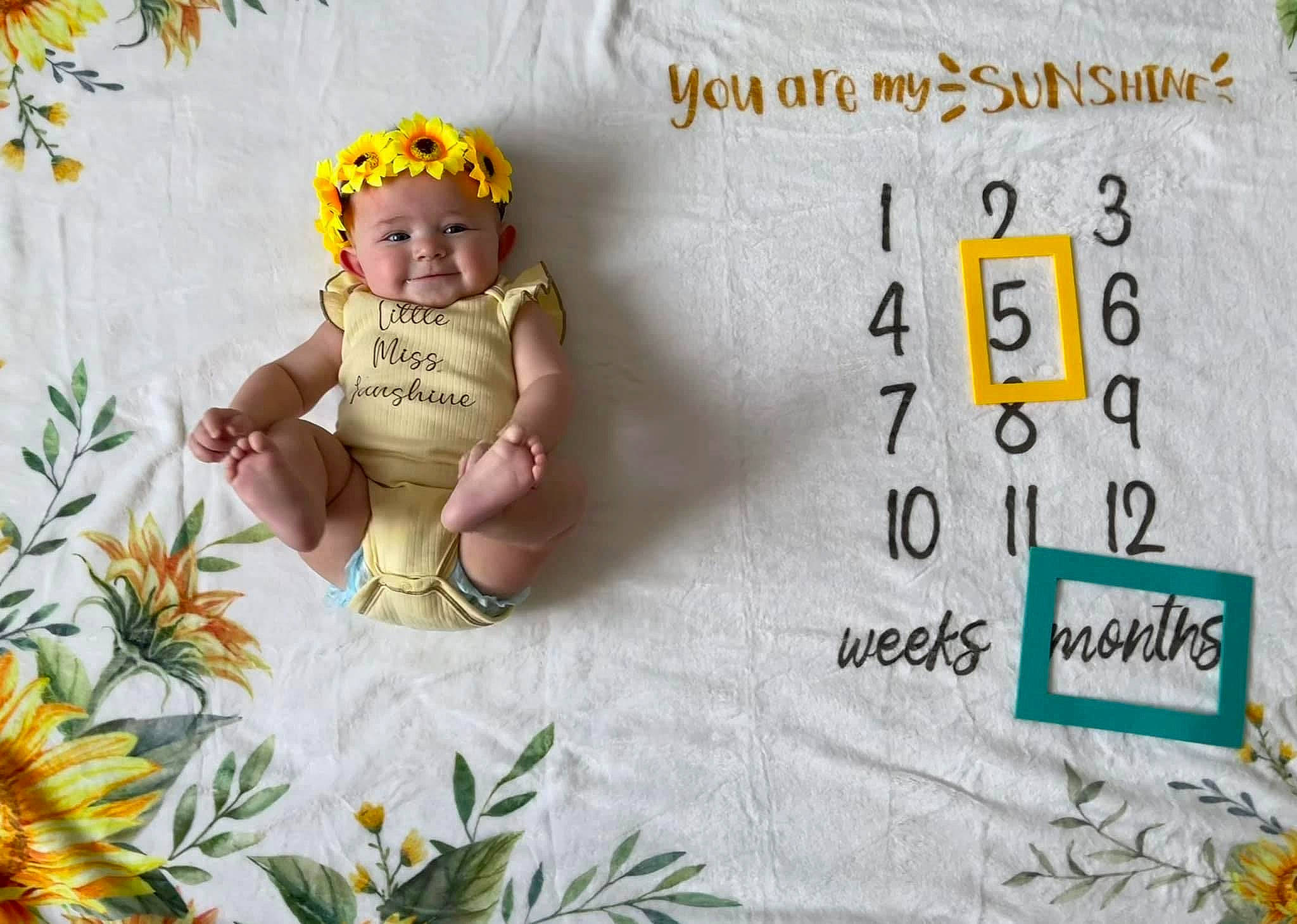 Avaleigh joined the competition — help win amazing prizes! baby, baby_toddler_clothing, child, design, fashion_accessory, flower, font, grass, happy, headwear, linens, pattern, people_in_nature, person, petal, plant, product, rectangle, smile, textile