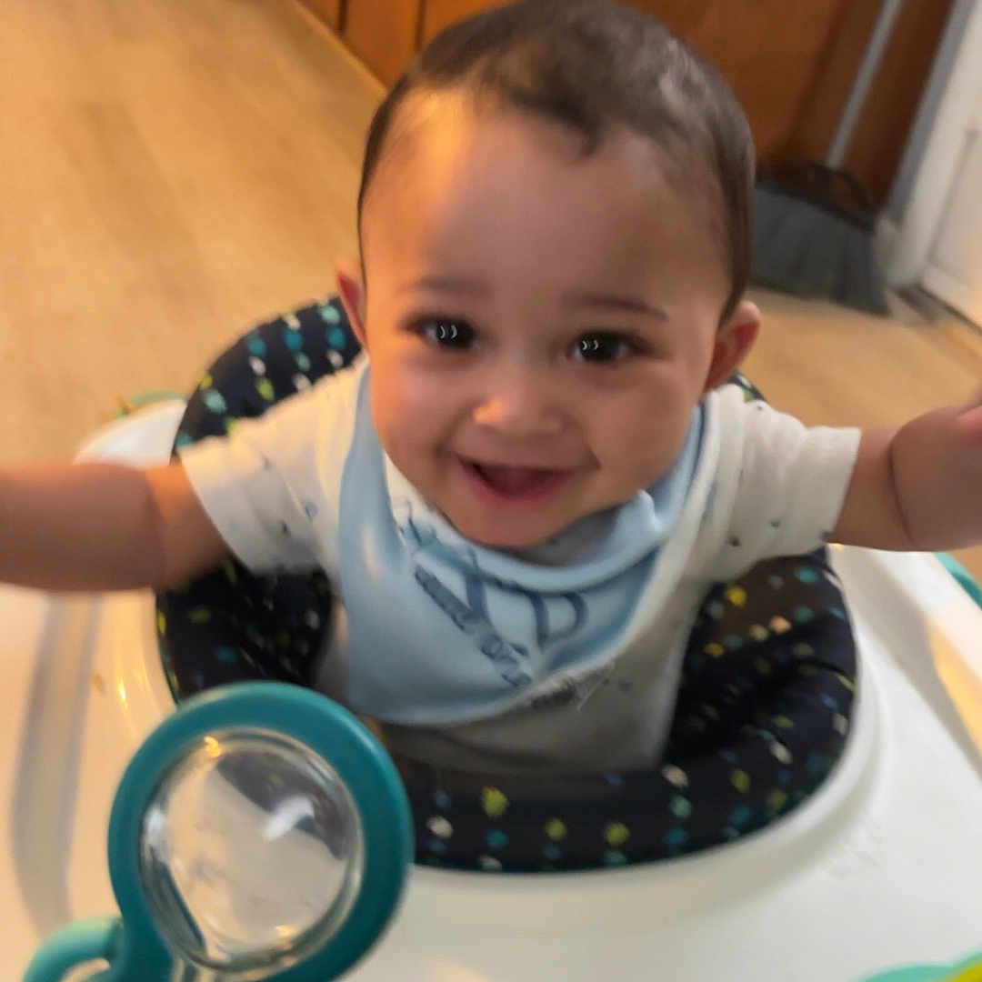 Raz joined the competition — help win amazing prizes! baby, beverage, bodypart, cabinet, coffee, coffeecup, cutlery, face, finger, furniture, hand, happy, head, person, photography, portrait, smile, spoon, toy, wood