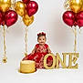 baby, child, birthday, celebration, cake, balloons, red_dress, gold, smile, happy, portrait, party, one_year, studio, decor, festive, infant, girl, sitting, cute